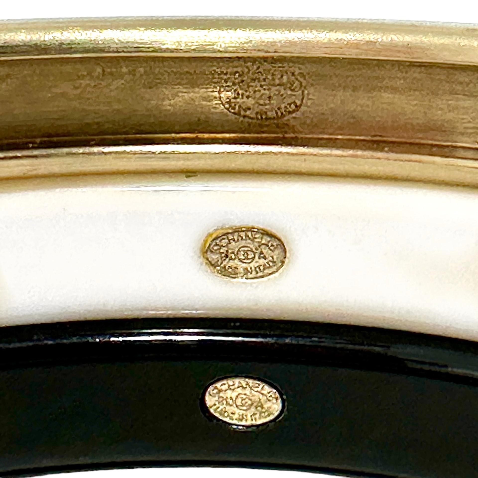 Vintage Chanel Bangle Set of 3: In Gold Tone, White, & Black Resin With CC Logo  For Sale 1