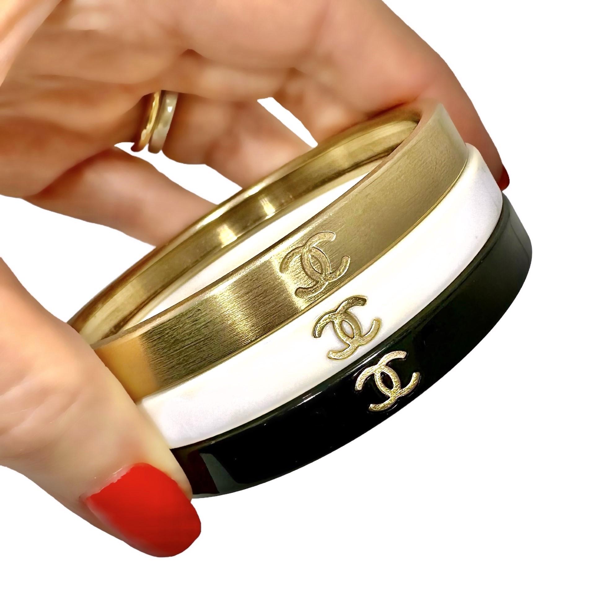 Vintage Chanel Bangle Set of 3: In Gold Tone, White, & Black Resin With CC Logo  For Sale 2