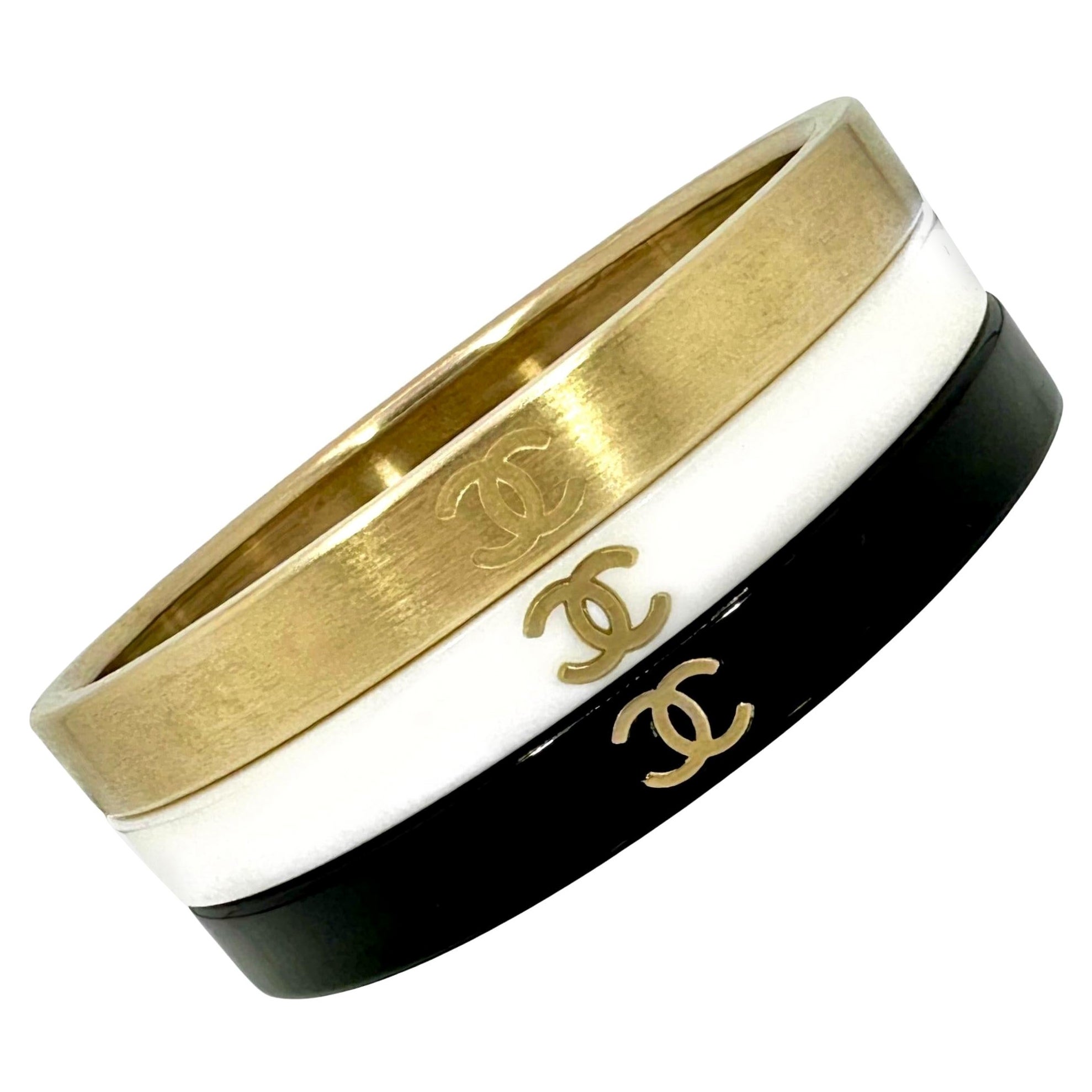 Vintage Chanel Bangle Set of 3: In Gold Tone, White, & Black Resin With CC Logo