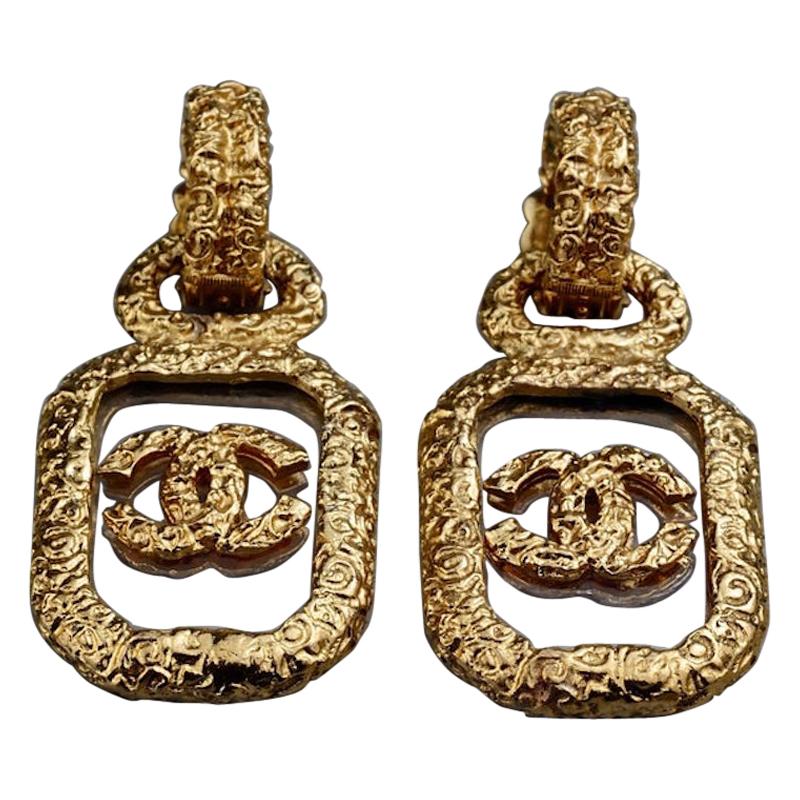 Vintage CHANEL Baroque Plexiglass Floating Logo Earrings