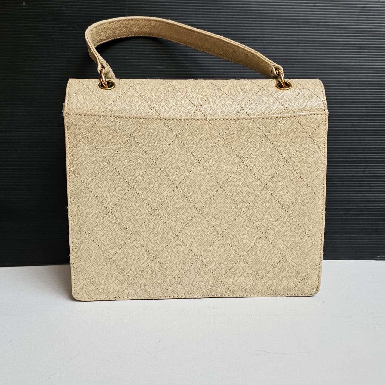 Women's or Men's Vintage Chanel Beige Caviar Quilted Top Handle Bag For Sale