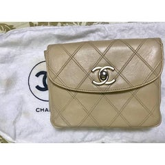 Vintage CHANEL beige leather waist purse, fanny pack, hip bag with gold CC motif