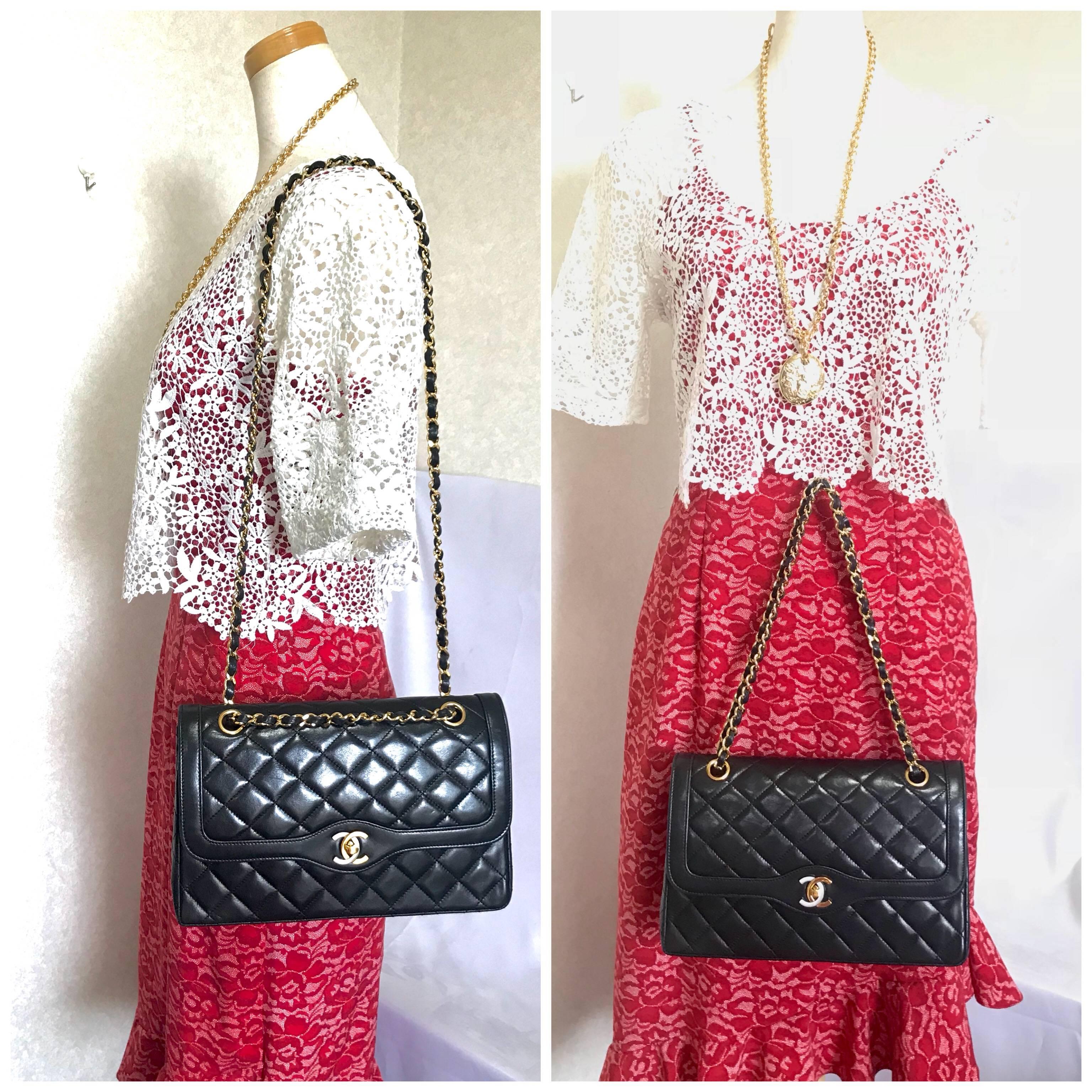Vintage Chanel black 2.55 classic double flap bag with gold and silver CC motif. For Sale 12