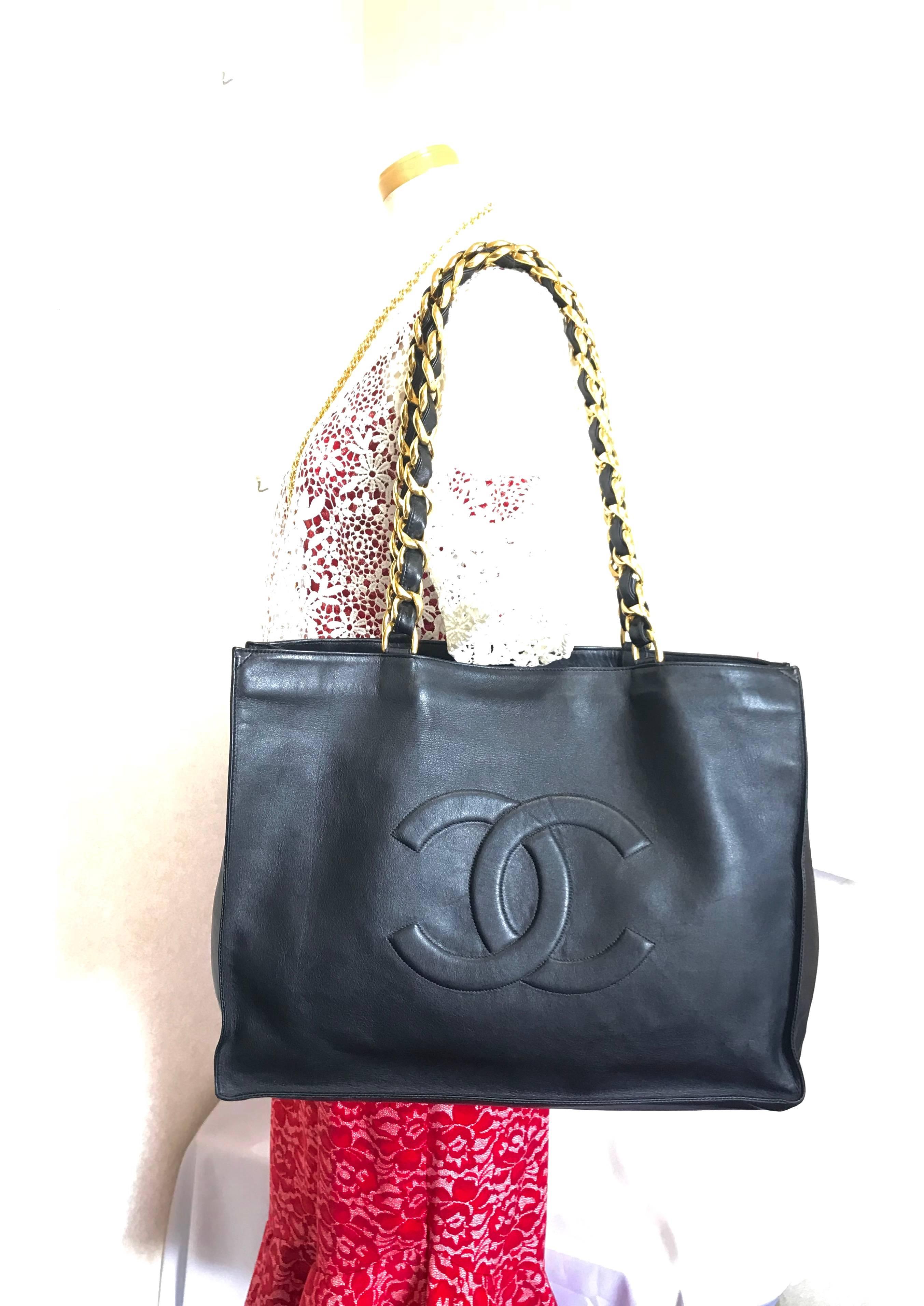 Chanel Vintage black calfskin large tote bag with gold tone chain handles and CC 11