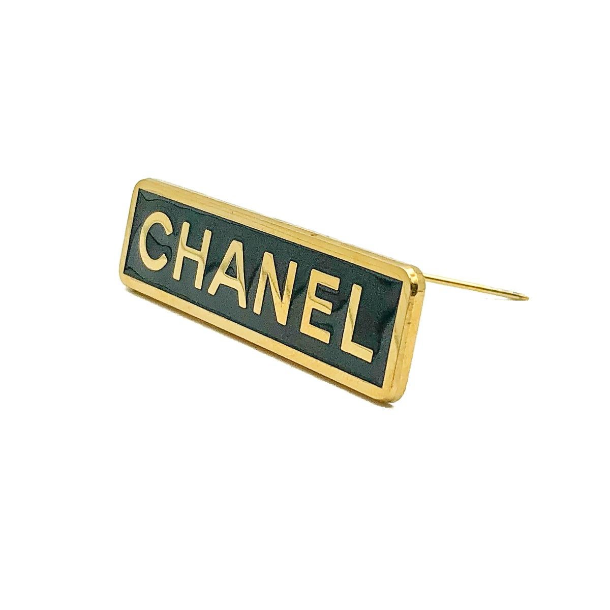 A Vintage Chanel Enamel Employee Pin. Crafted in black enamel punctuated with the iconic brand name CHANEL.
Vintage Condition: Very good without damage or noteworthy wear.
Materials: Gold plated brass, enamel
Signed: These pieces were not