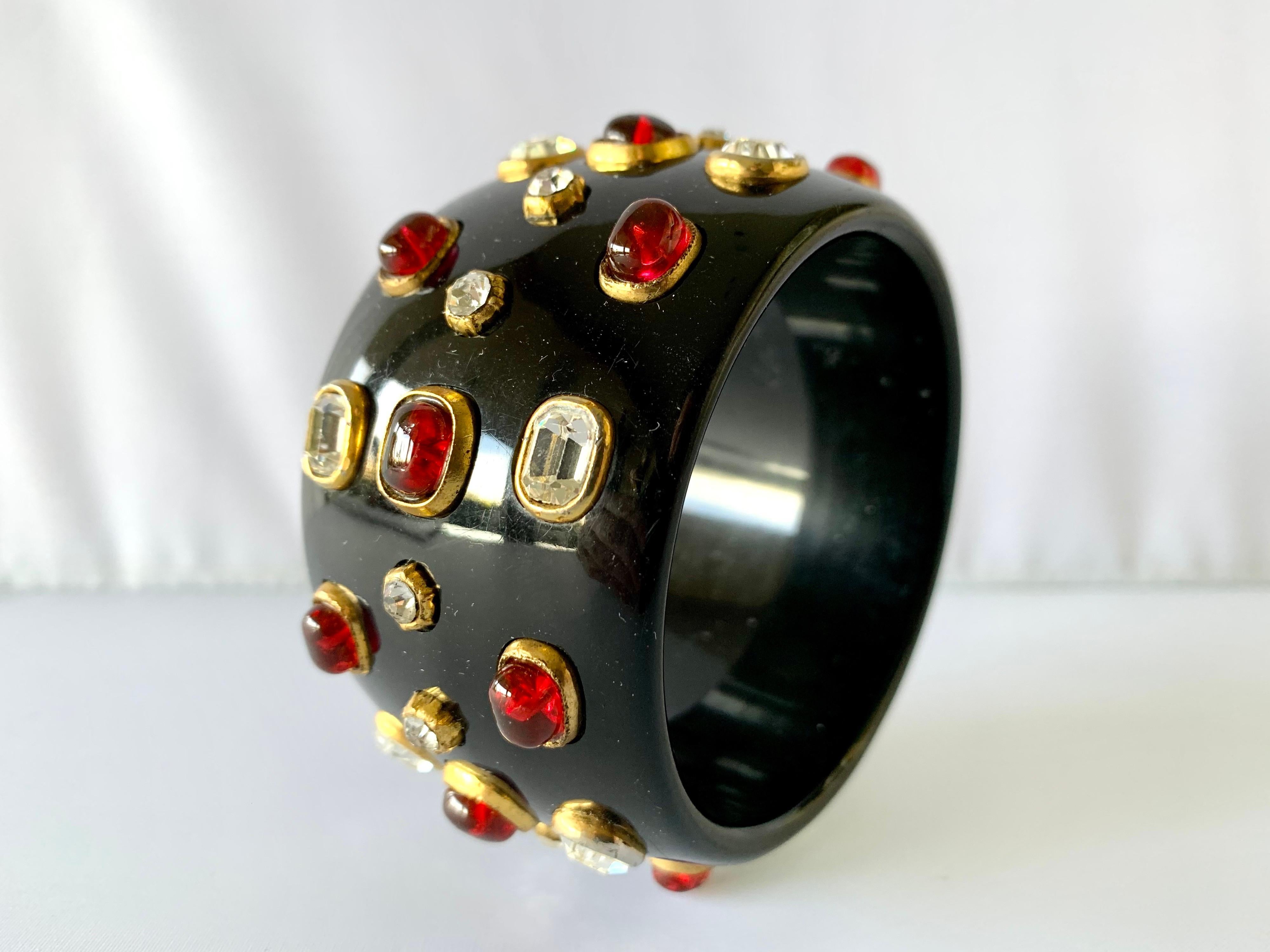 Scarce vintage Coco Chanel jeweled black bangle bracelet - the bracelet is comprised of black phenolic and it is accented by large 