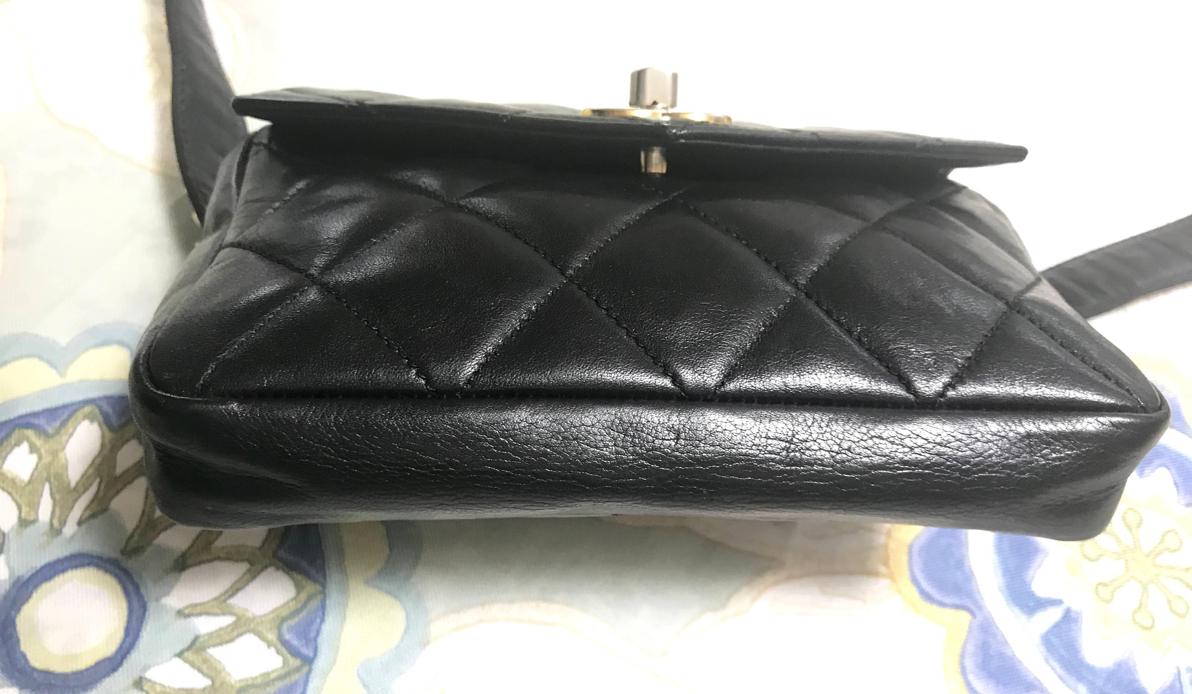 Black Chanel Vintage black lamb waist bag fanny pack with golden chain belt and CC 
