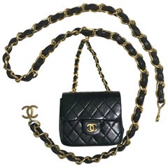 Vintage CHANEL black lambskin mini 2.55 bag charm chain leather belt with CC.