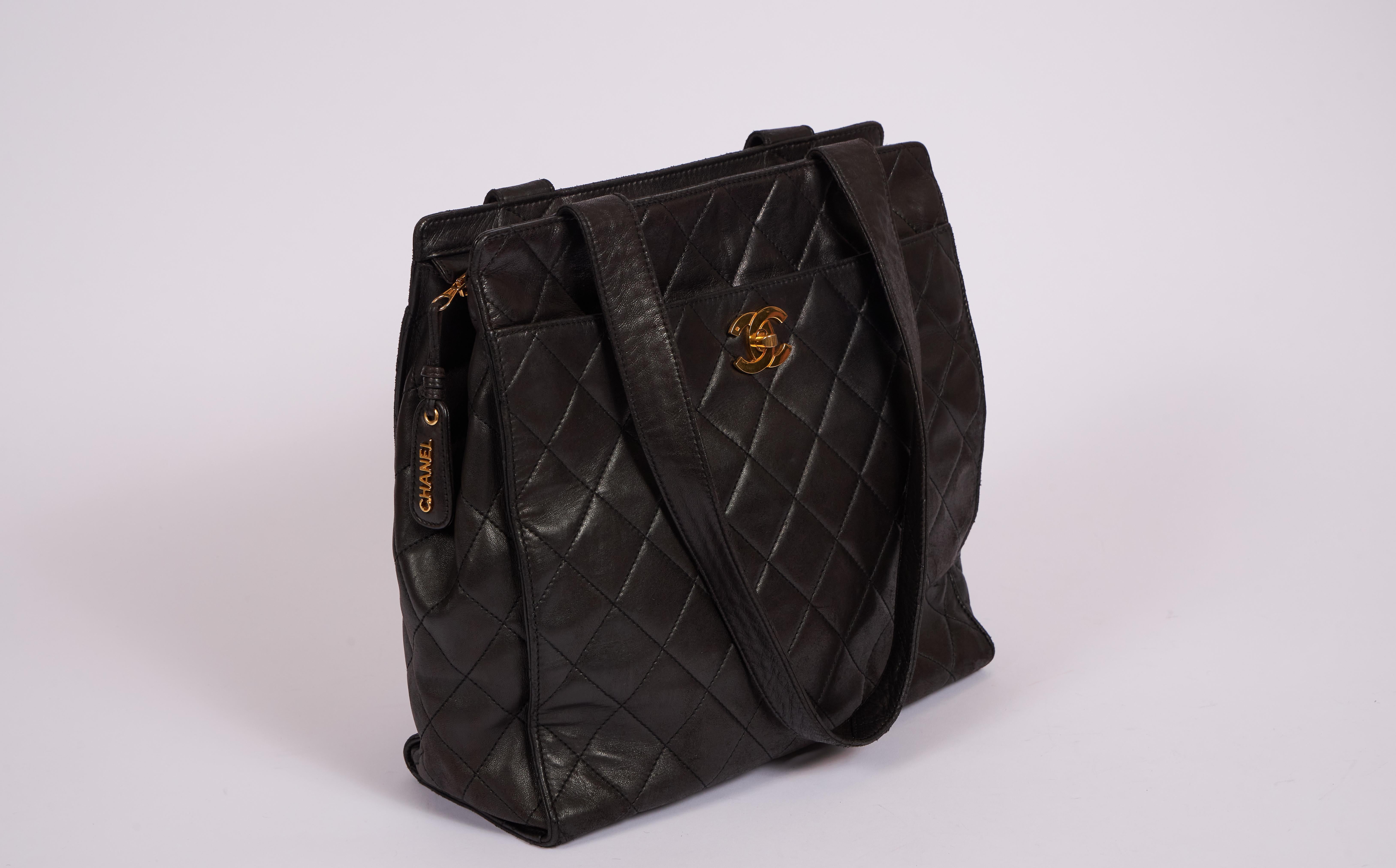 Chanel vintage black leather quilted large shoulder tote with multiple compartments. Handle drop 12
