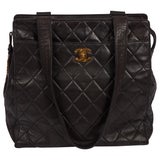 vintage CHANEL black lambskin shoulder bag with golden large CC logo motif.  For Sale at 1stDibs