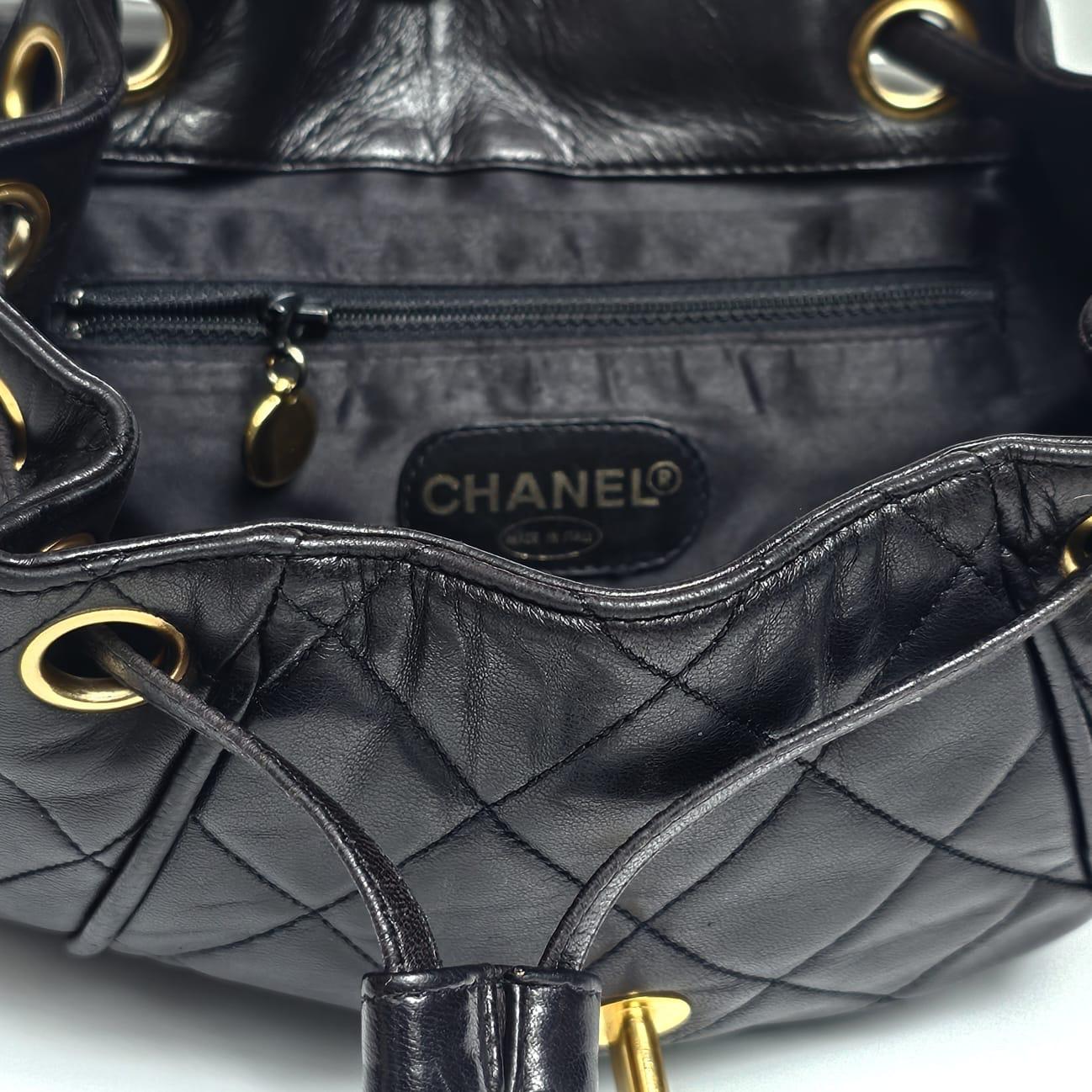Women's Vintage Chanel Black Lambskin Quilted Small Flap Backpack For Sale