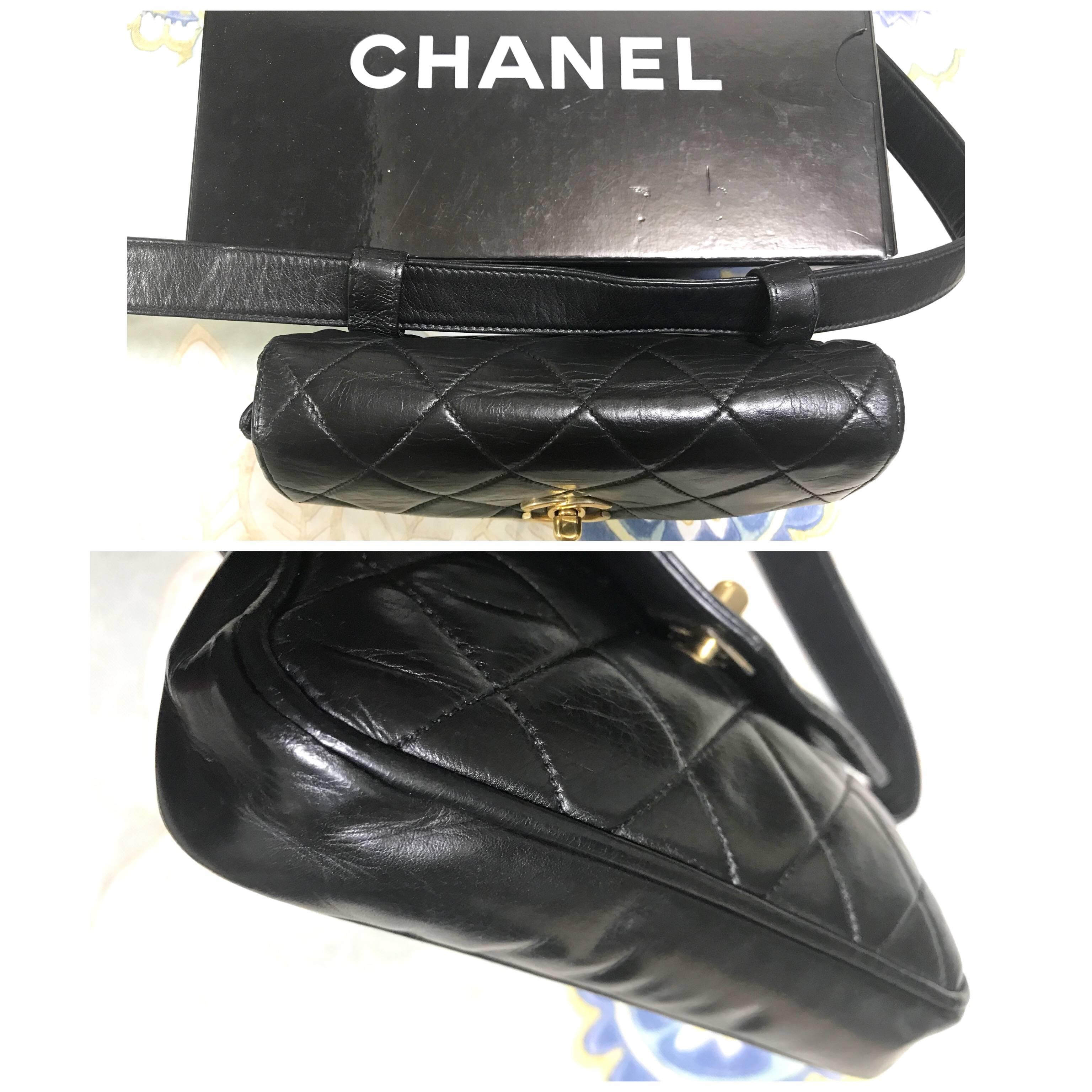 Black Chanel Vintage black leather waist purse and/or fanny bag with belt and CC motif