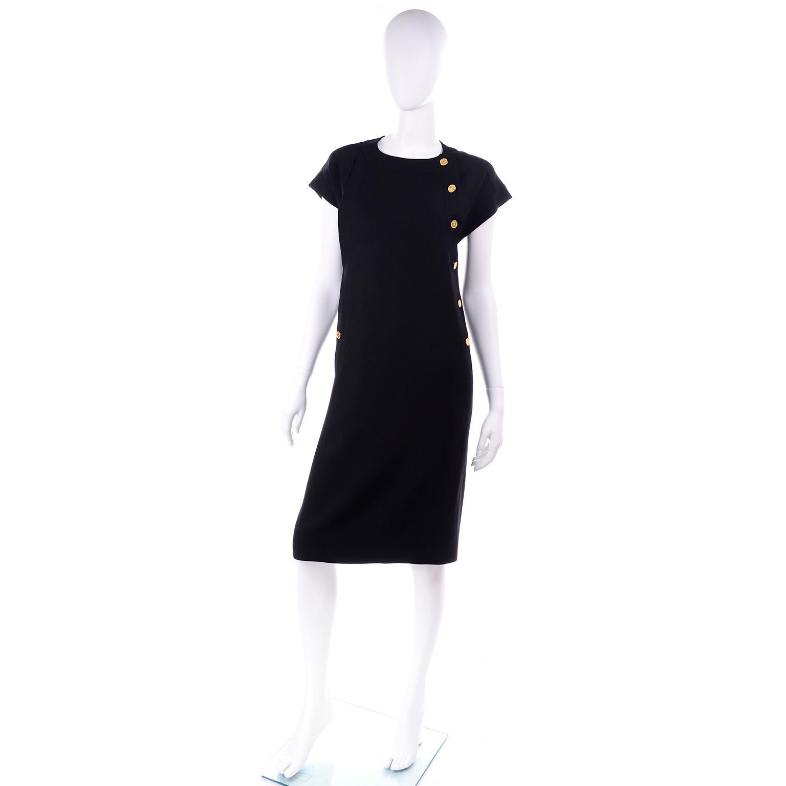 This is a great black linen dress purchased at Garfinckel's in the 1980's.  This shift style dress has cap sleeves and  the black Chanel Boutique Paris label and is marked a French size 40. Fits like a Medium or a size 8. The black fabric is 100%