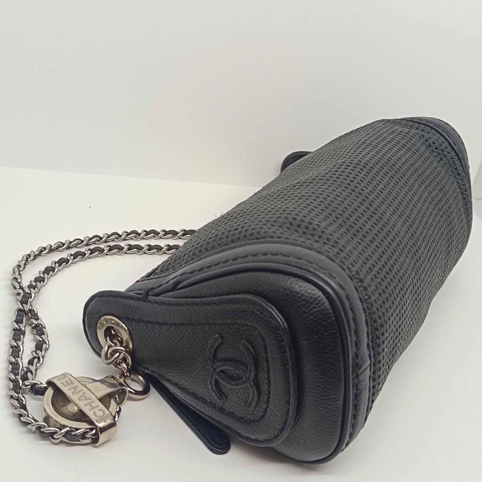 Chanel pochette shoulder bag. For everyday casual wear. Series #8. Overall still in very good condition, with minor signs of wear around the perforated area. Comes with its holo, card and dust bag.