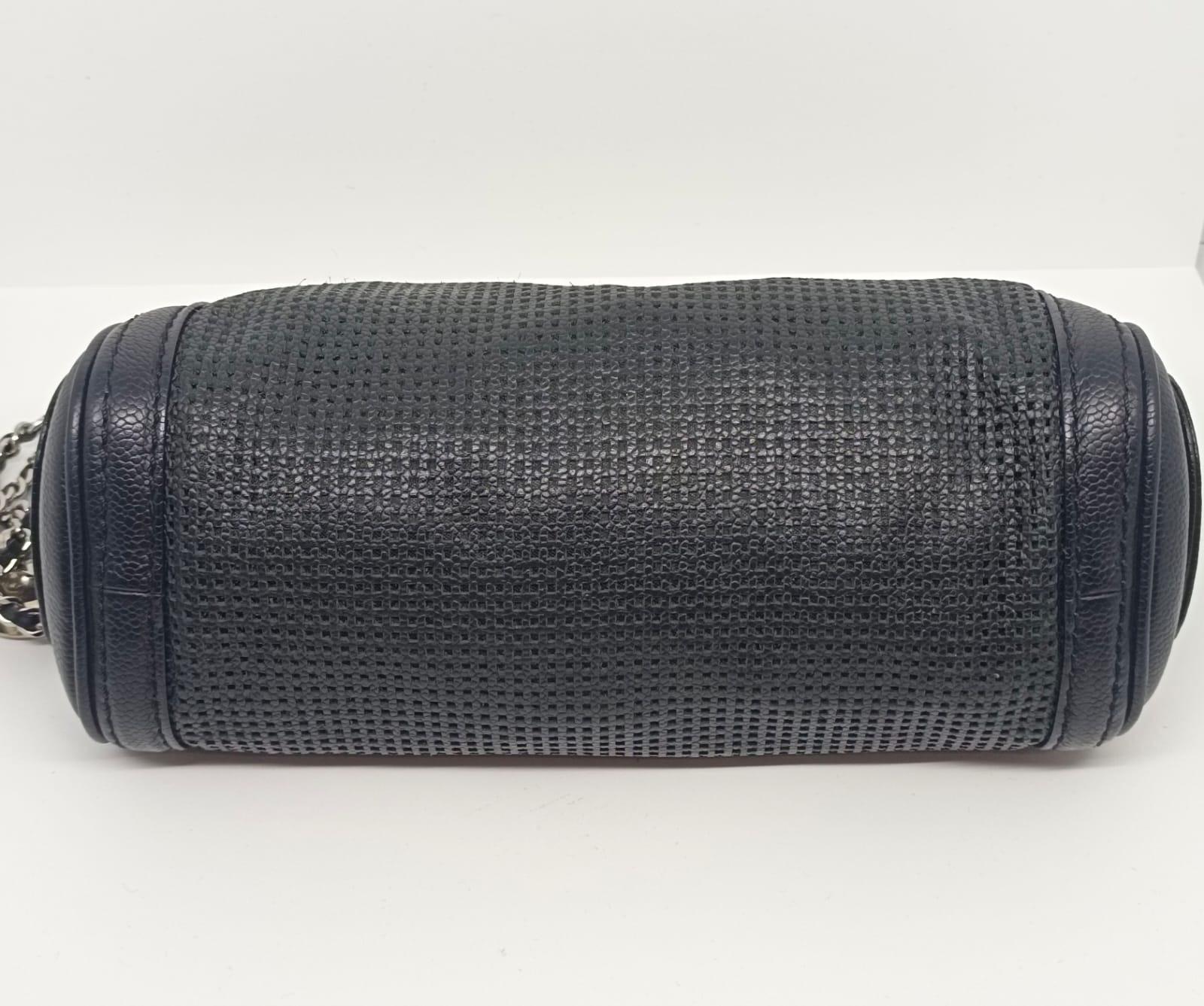 Vintage Chanel Black Perforated Pulley Pochette Bag In Good Condition In Jakarta, Daerah Khusus Ibukota Jakarta