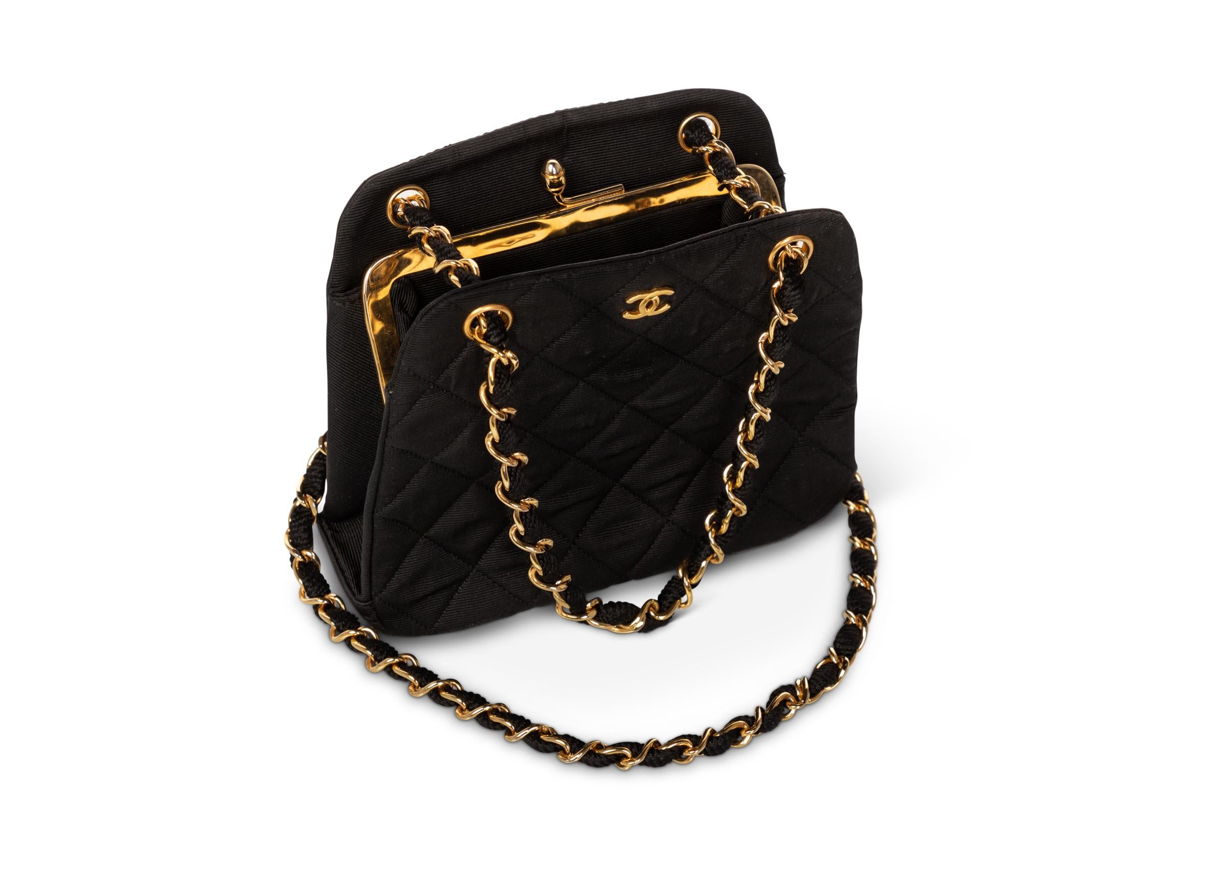 Chanel has commonly subscribed to the idea that less is more. Often times, Chanel designs are coveted for their subtlety and practicality. This Chanel bag is a perfect example. Made from a jet-black faille, the bag has been lightly quilted. The