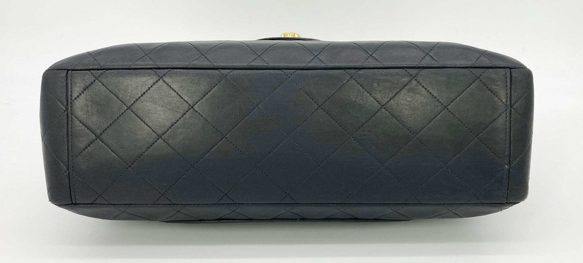 Vintage Chanel Black Quilted Lambskin Maxi Classic Flap In Good Condition In Philadelphia, PA