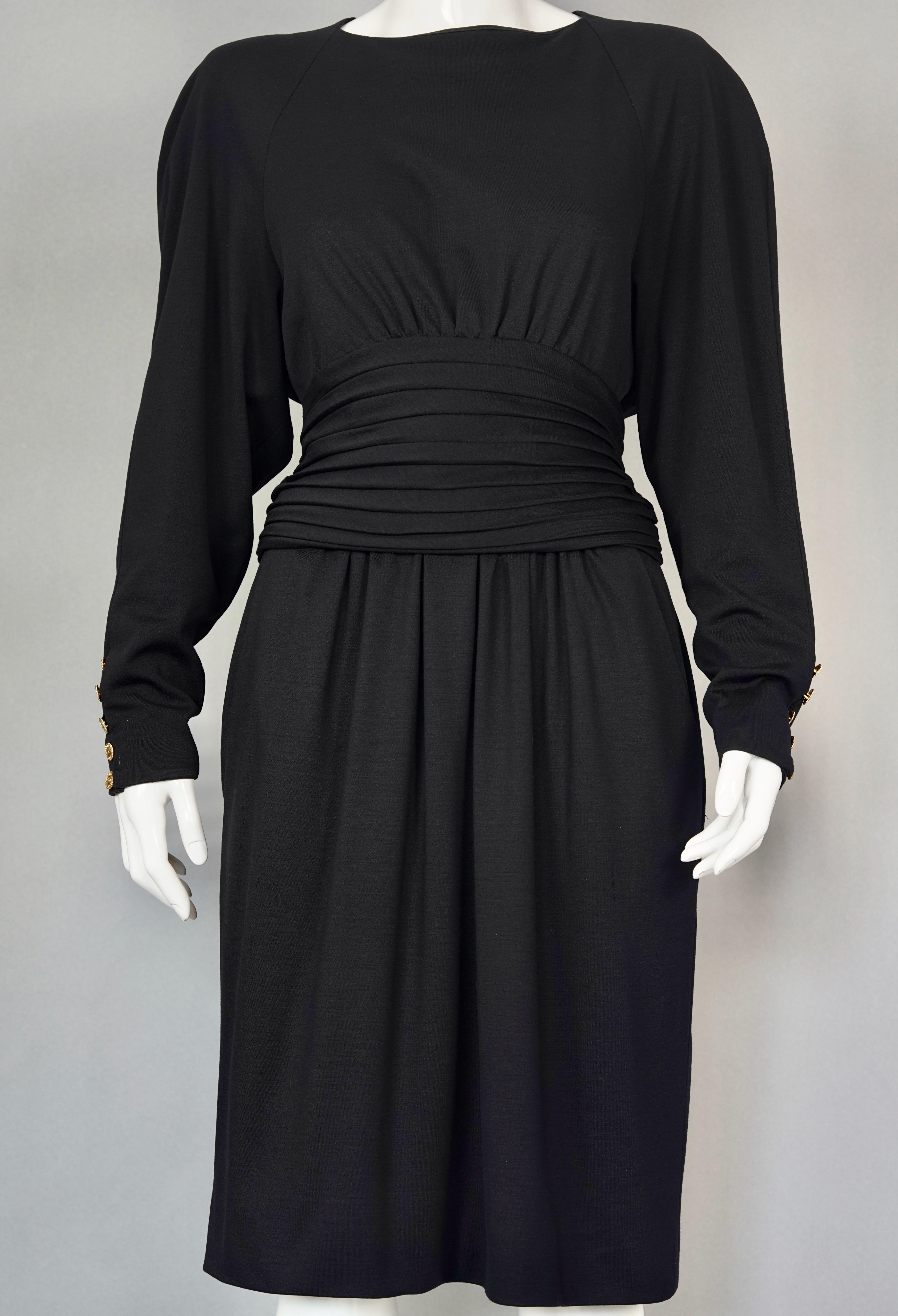 Vintage CHANEL BOUTIQUE Cummerbund Button Down Wool Silk Black Dress

Measurements taken laid flat, please double bust, waist and hips:
Shoulder: 18.50 inches (47 cm)
Sleeves: 23.42 inches (59.5 cm)
Bust: 18.50 inches (47 cm)
Waist: 15.74 inches (40