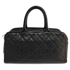 Retro CHANEL Bowling Bag in Black Grained Leather.