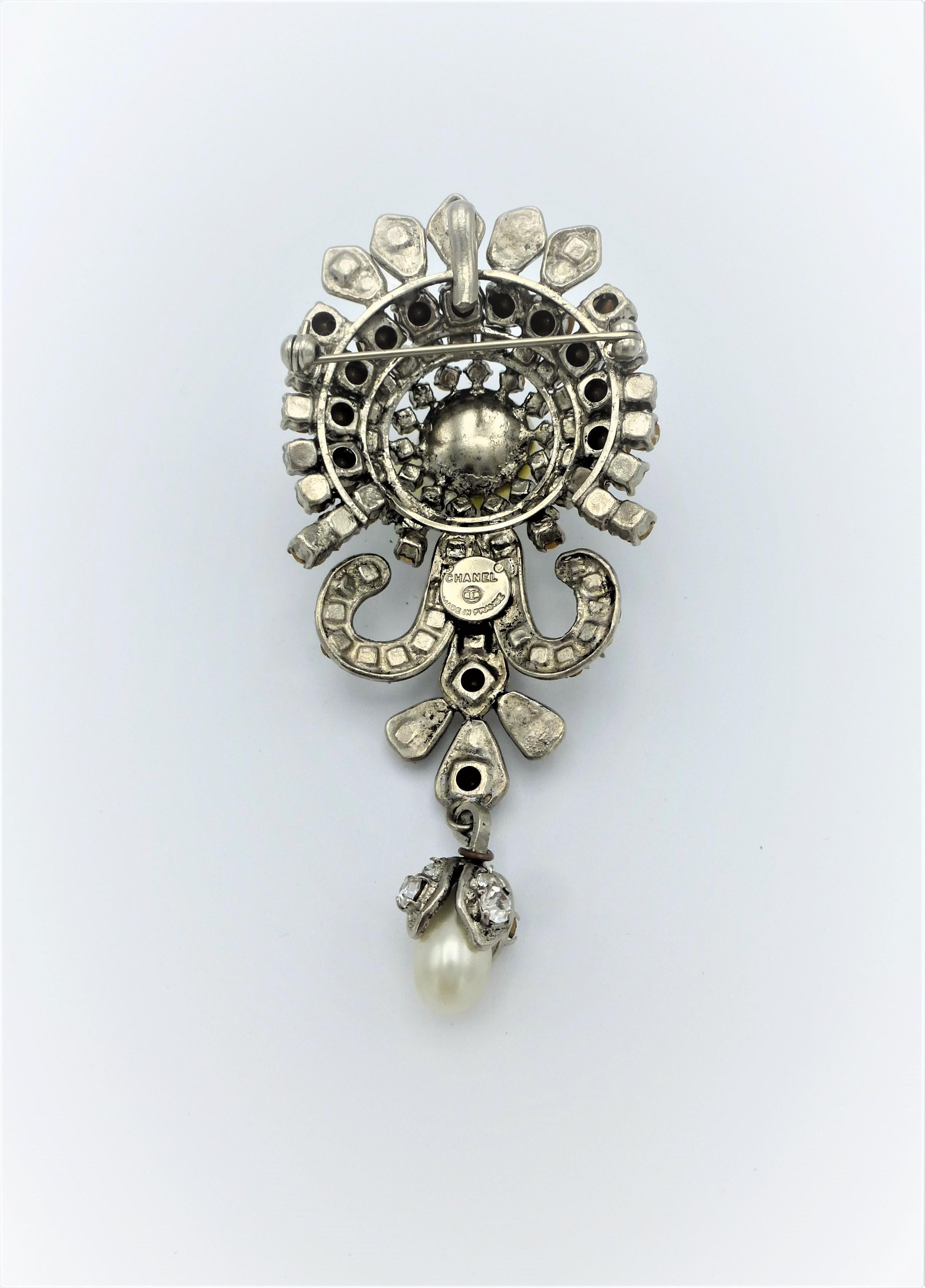 Baroque Revival CHANEL brooch and Pendant, Rhodium plated metal,  Rhinestones, signed 1970/80  For Sale