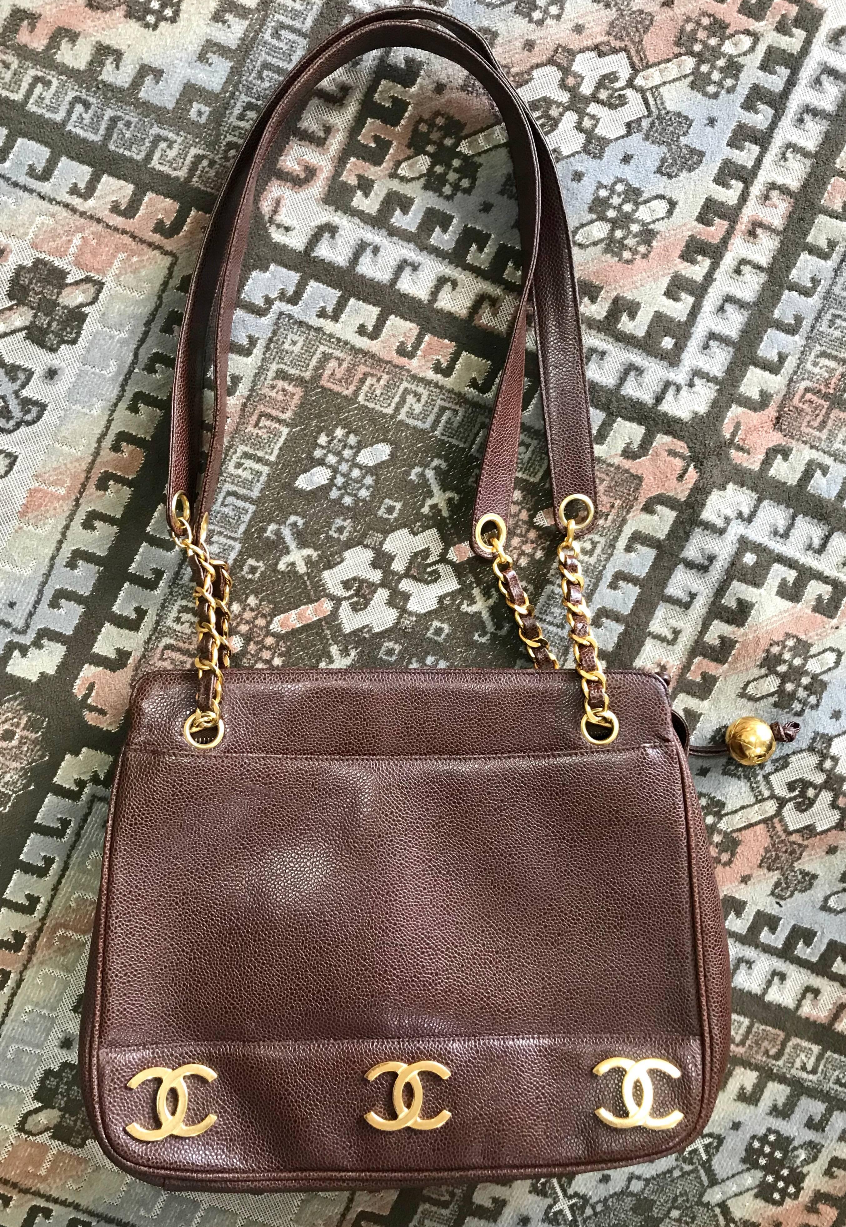 1990s. Vintage CHANEL brown caviar leather chain shoulder bag with 3 golden CC marks on both sides. Classic purse.

Beautiful condition!

Introducing another classic but elegant vintage CHANEL back in brown caviar leather back in the 90's.
Featuring
