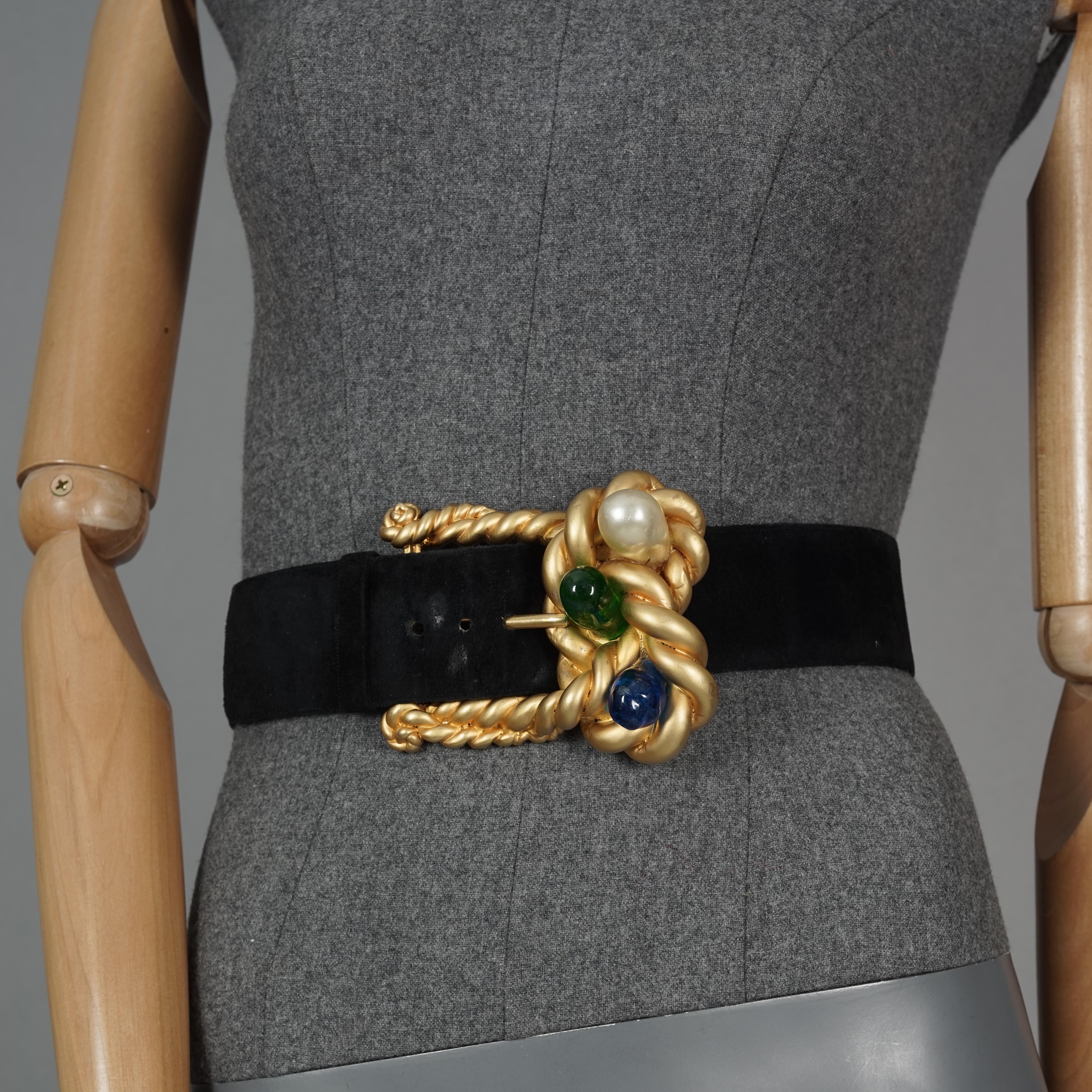 Vintage CHANEL by CASTELLANE Gripoix Pearl Gilt Rope Buckle Leather Belt

Measurements:
Buckle Height: 3.74 inches (9.5 cm)
Belt Hight: 1.97 inches (5 cm)
Wearable Length: 23.62 inches (60 cm) to 26.57 inches (67.5 cm)
Total Length: 32.67 inches (83