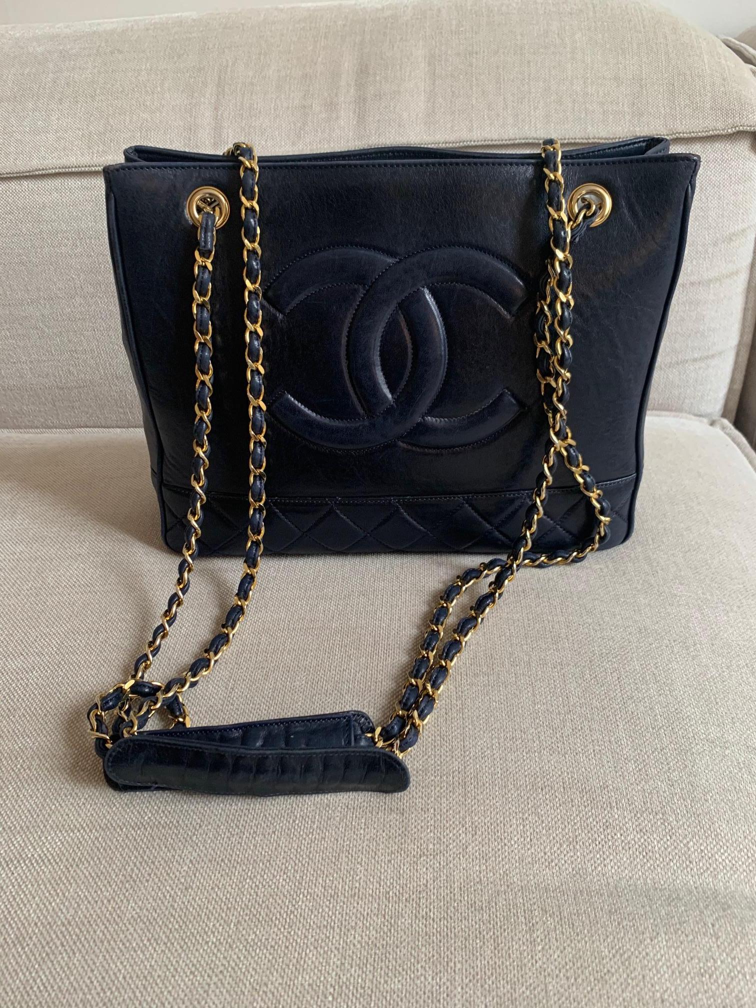 Vintage Chanel Cabas Circa 1980
Navy Leather / Half quilted leather at the bottom 
Inside Red leather 
Pocket inside and outside at the back 
Good condition 
Gold Chain 
Very Nice and Rare vintage Chanel Bag 

Dimensions:
32cm Width 
24cm Height
7