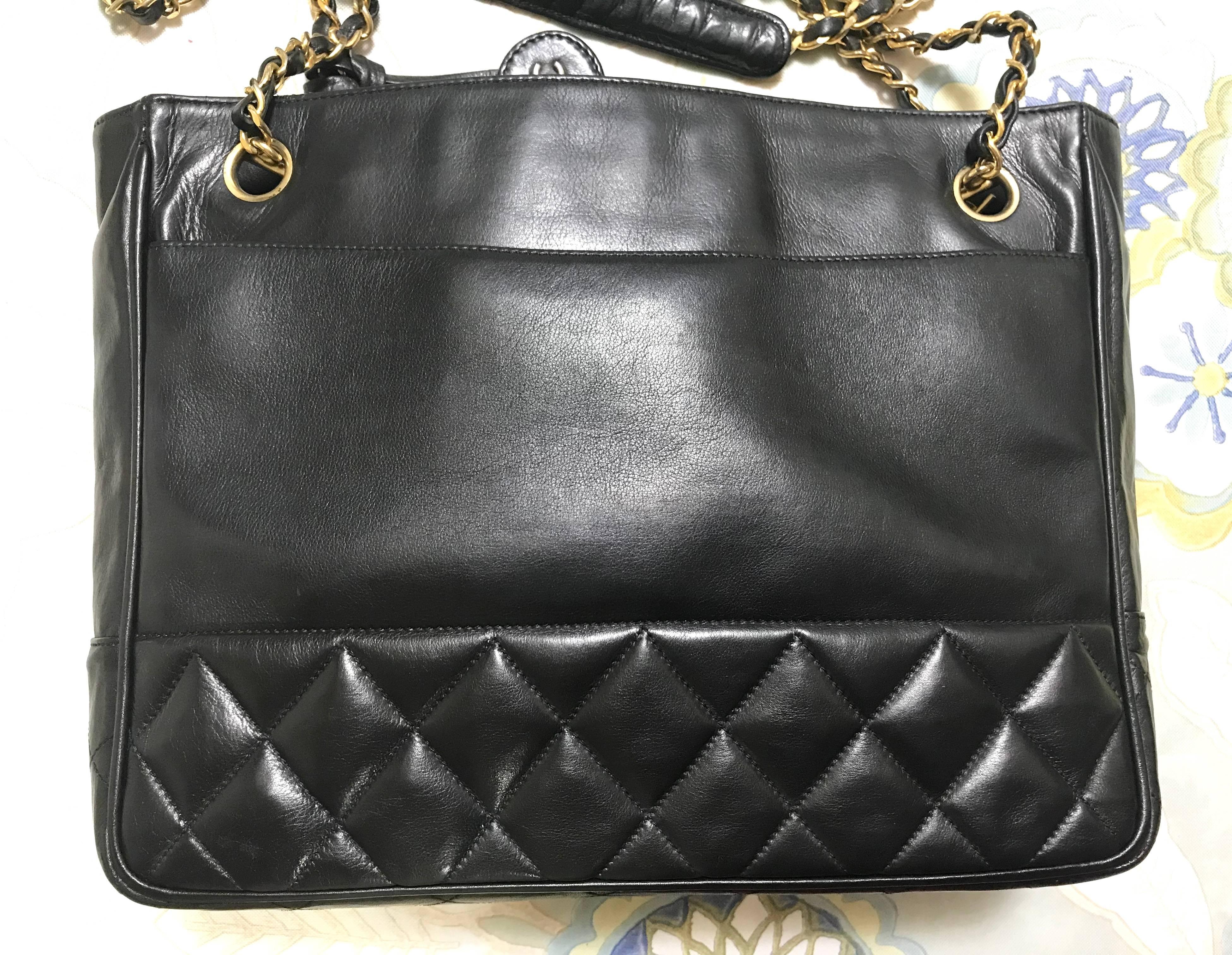 Black Vintage CHANEL classic black leather shoulder bag, tote purse with golden chains