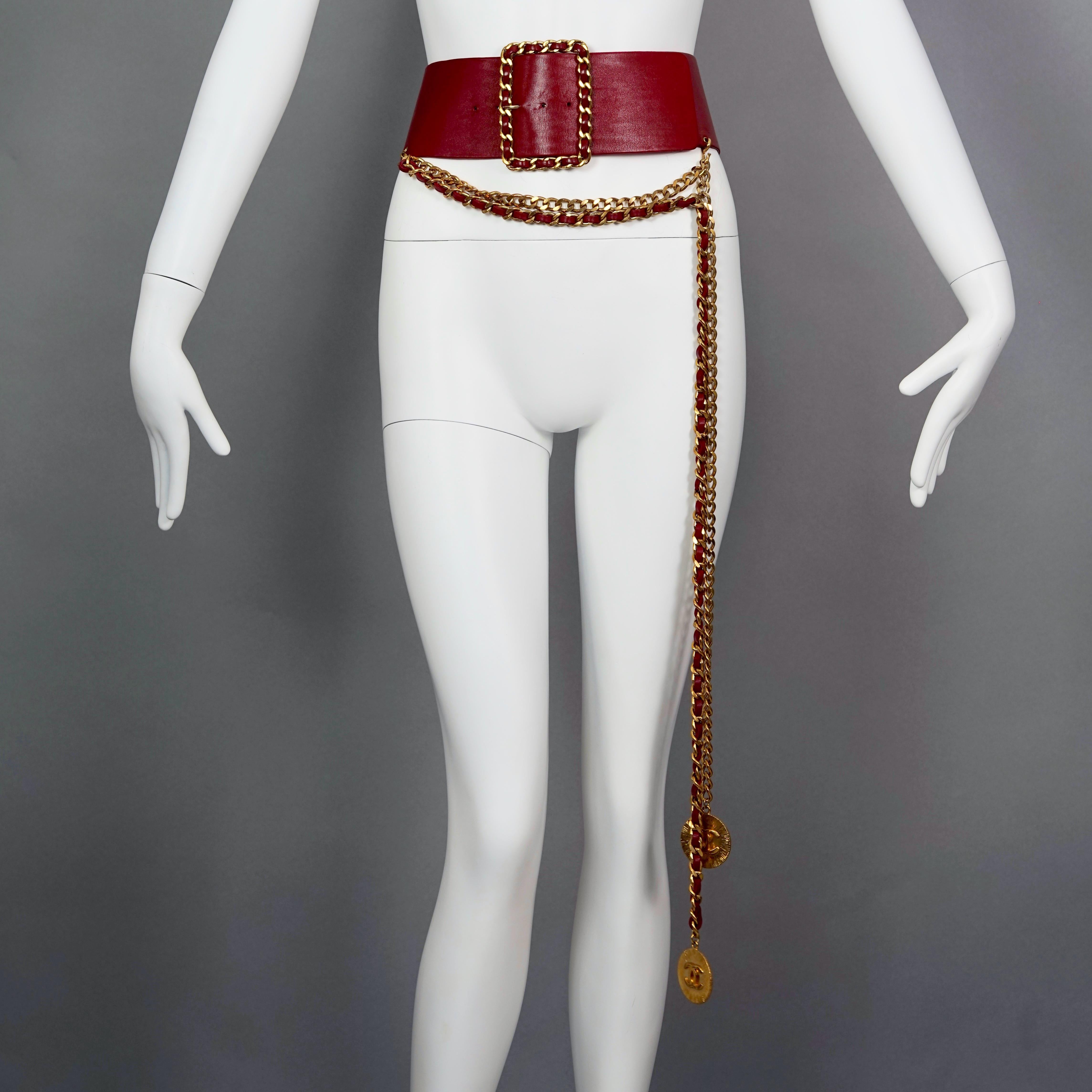 Vintage CHANEL Claudia Schiffer Wide Long Chain Medallion Red Leather Belt
As seen on Claudia Schiffer from the Spring/ Summer 1992 Chanel Campaign.

Measurements:
Will Fit Waists: 27.55 inches ( 70 cm first hole) up to 30.70 inches (78 cm last