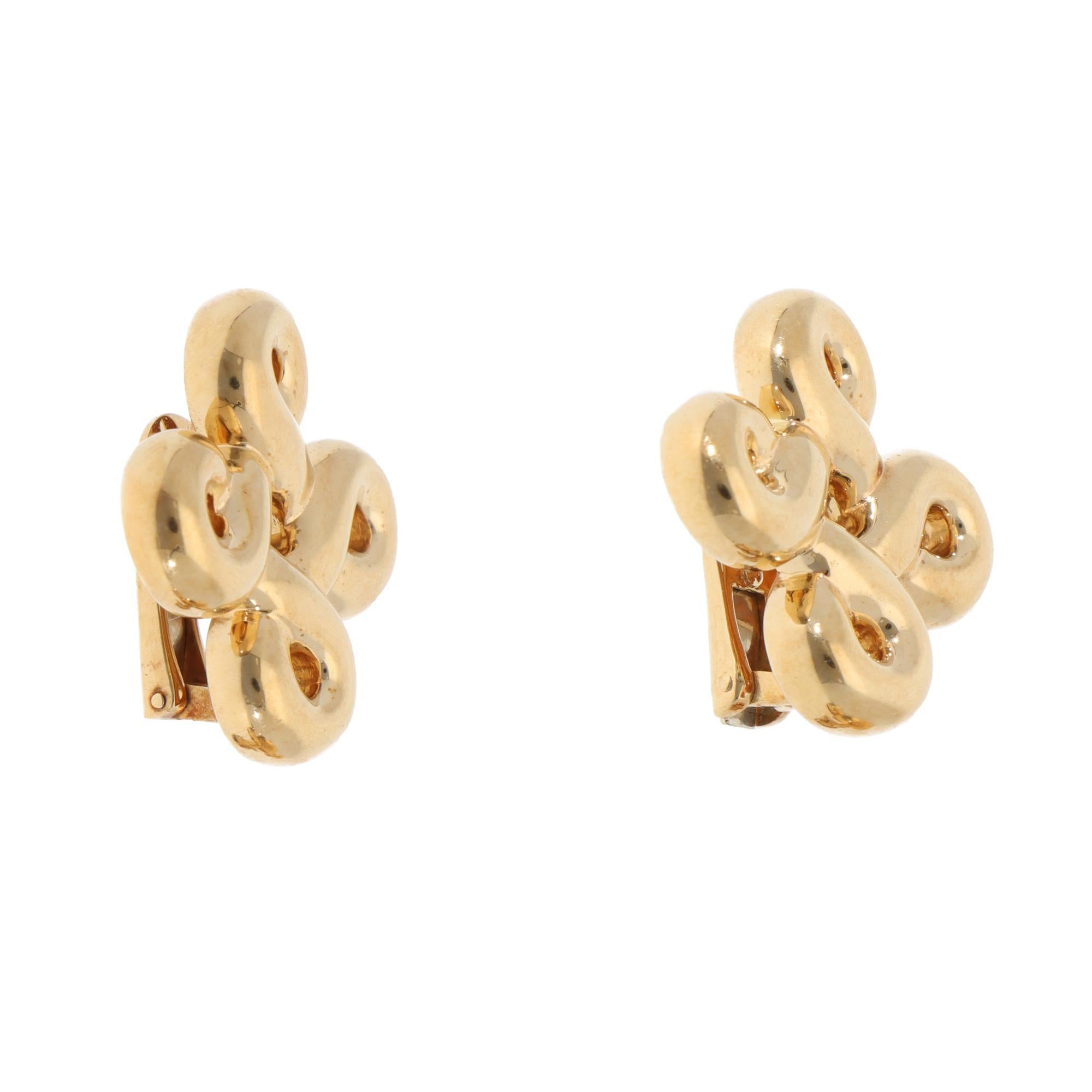 A stylish vintage pair of Chanel clip earrings set in 18k yellow gold.

From Chanel's discontinued collection, each earring is composed of four linked iconic Chanel C motifs set in polished yellow gold, which looks fantastic once on the ear. They
