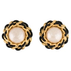 Vintage Chanel clip-on earrings with faux pearl and leather