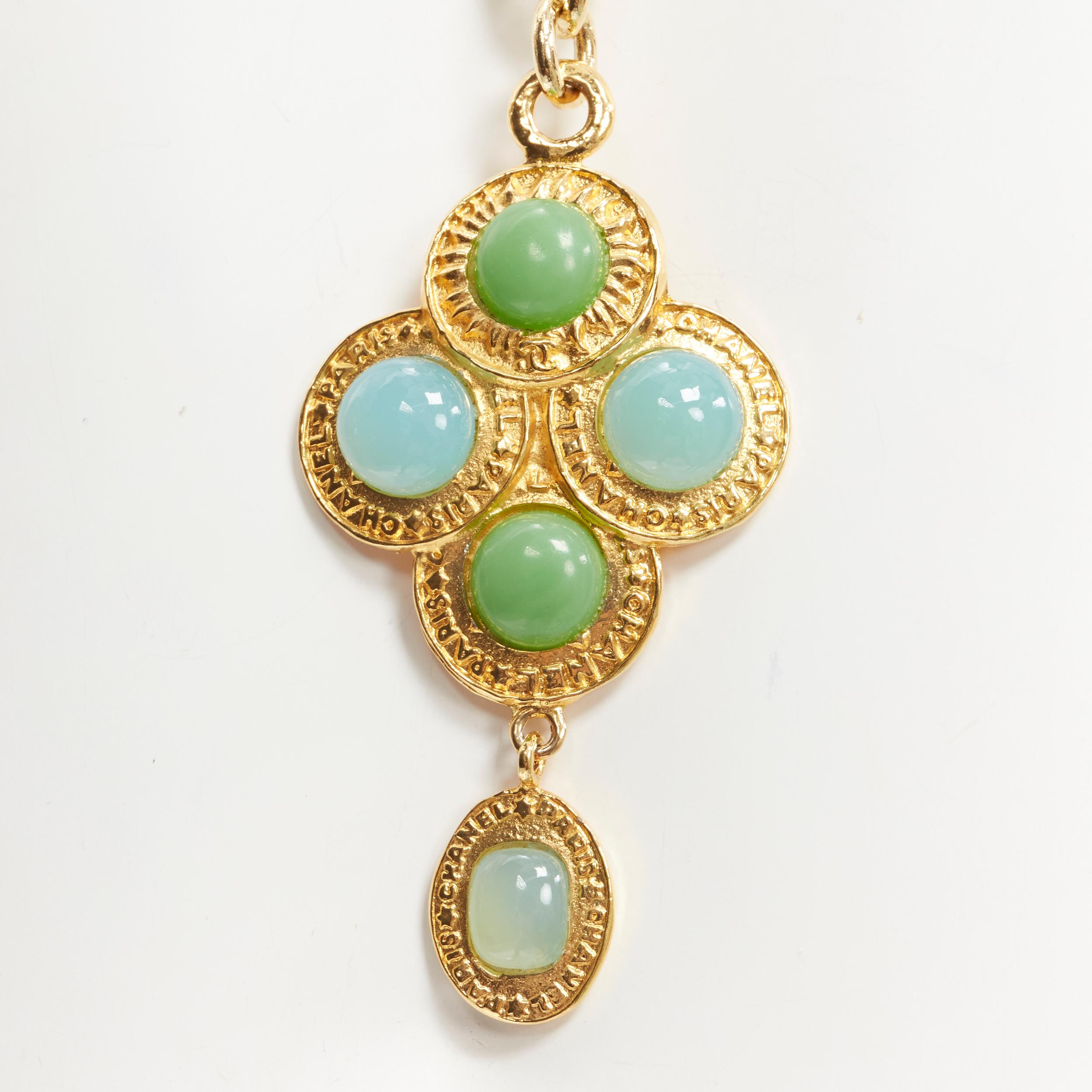 vintage CHANEL Collection 28 1991 jade turquoise green Gripoix pendent necklace
Brand: Chanel
Designer: Karl Lagerfeld
Collection: Collection 28 
Material: Metal
Color: Gold
Pattern: Solid
Closure: Clasp
Extra Detail: Gold-tone metal. Jade and