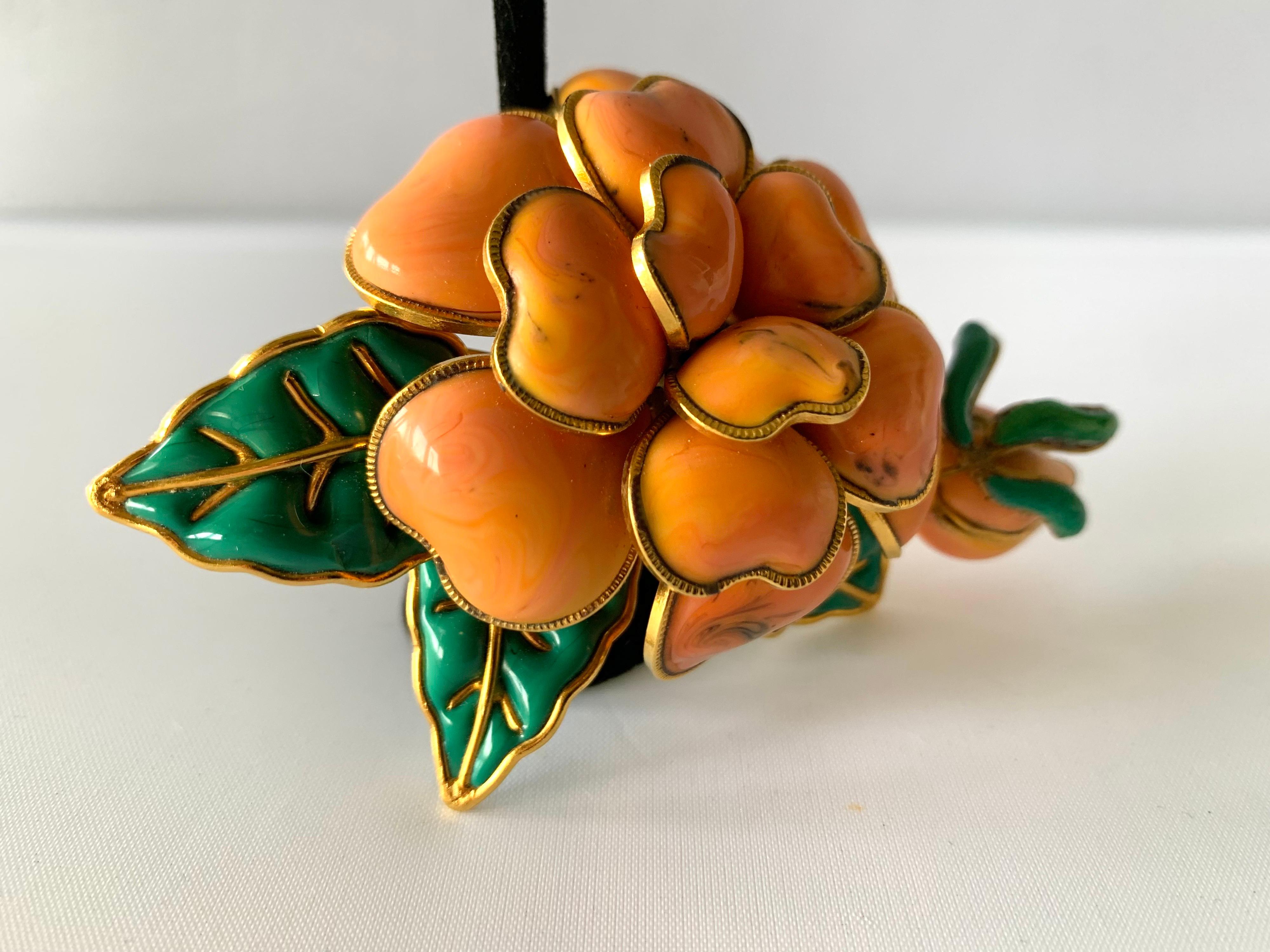 Unusual and scarce Coco Chanel double camellia brooch, exquisitely handcrafted out of coral and emerald green  