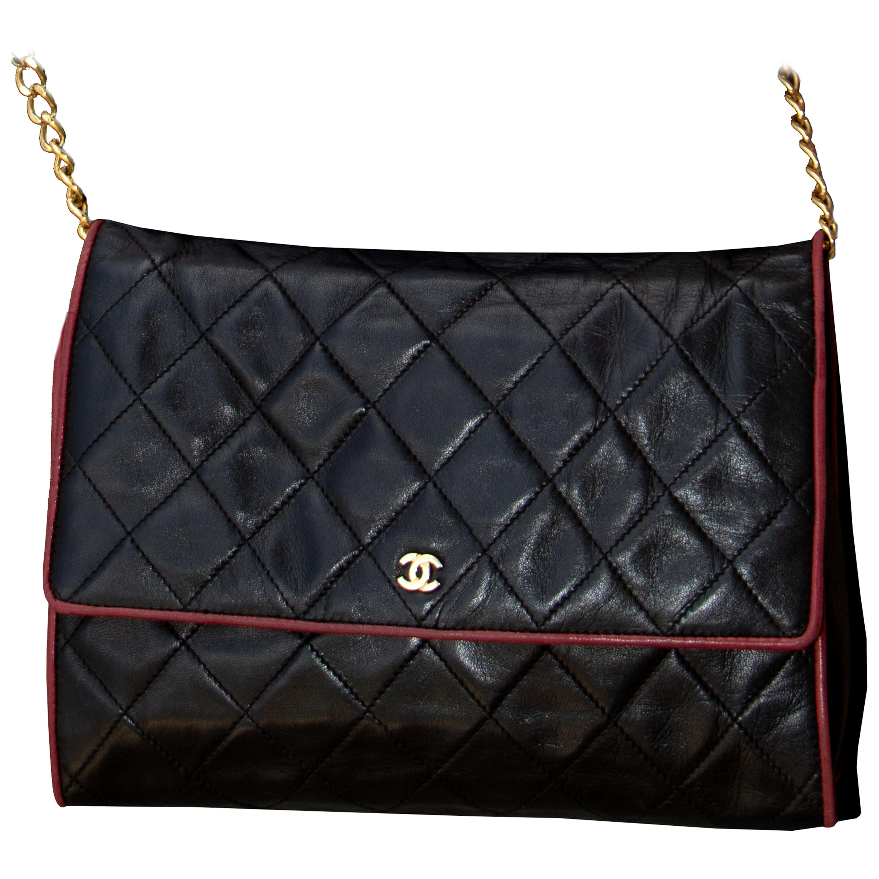 Vintage Chanel Crossbody Black Leather with Red Piping bag