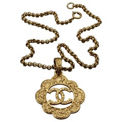 chanel cut out logo Vintage CHANEL Cutout Logo Flower Necklace