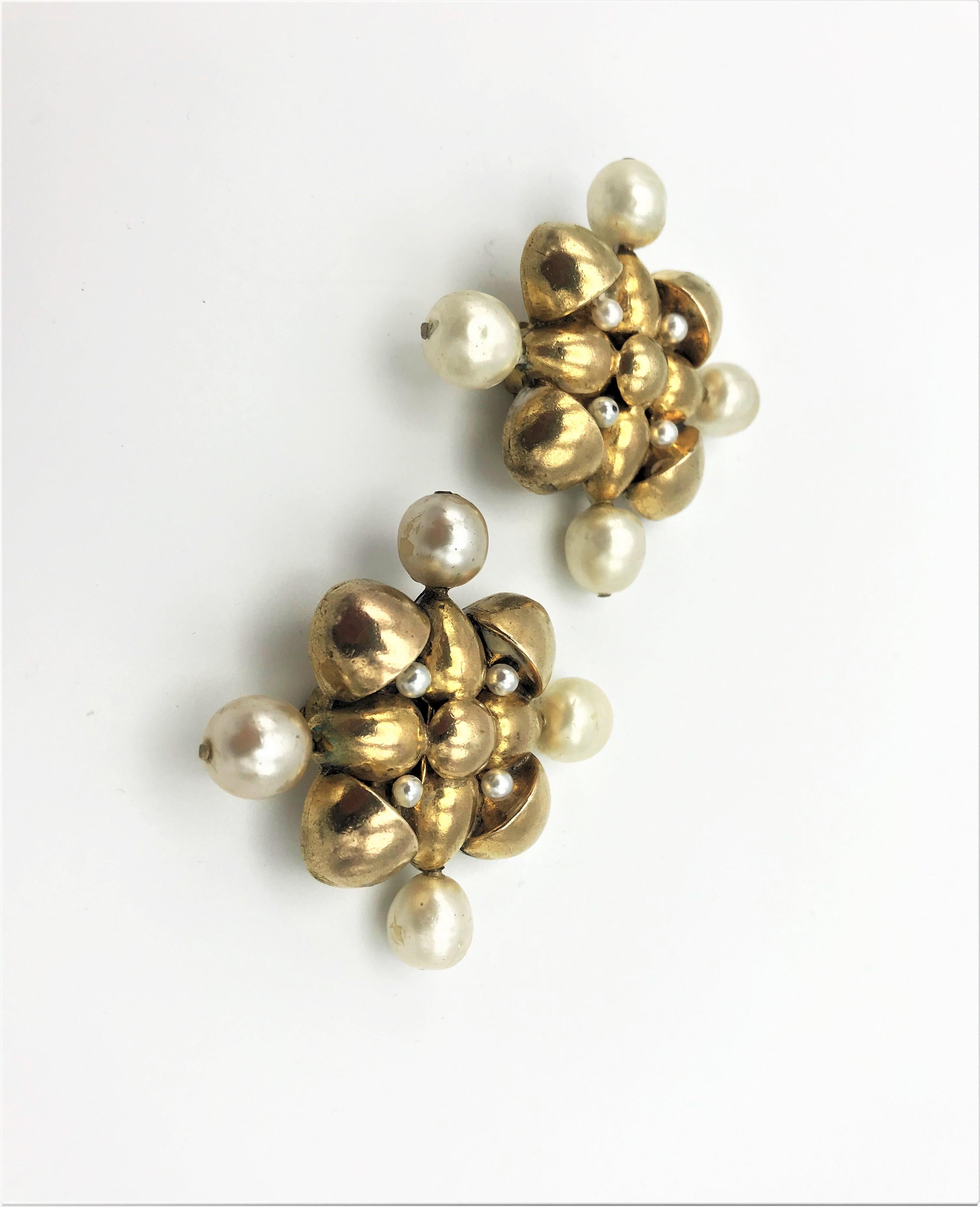 Women's  Chanel clip-on ear shape of a cross sign. 1970-1981, gold plated, faux pearls  For Sale