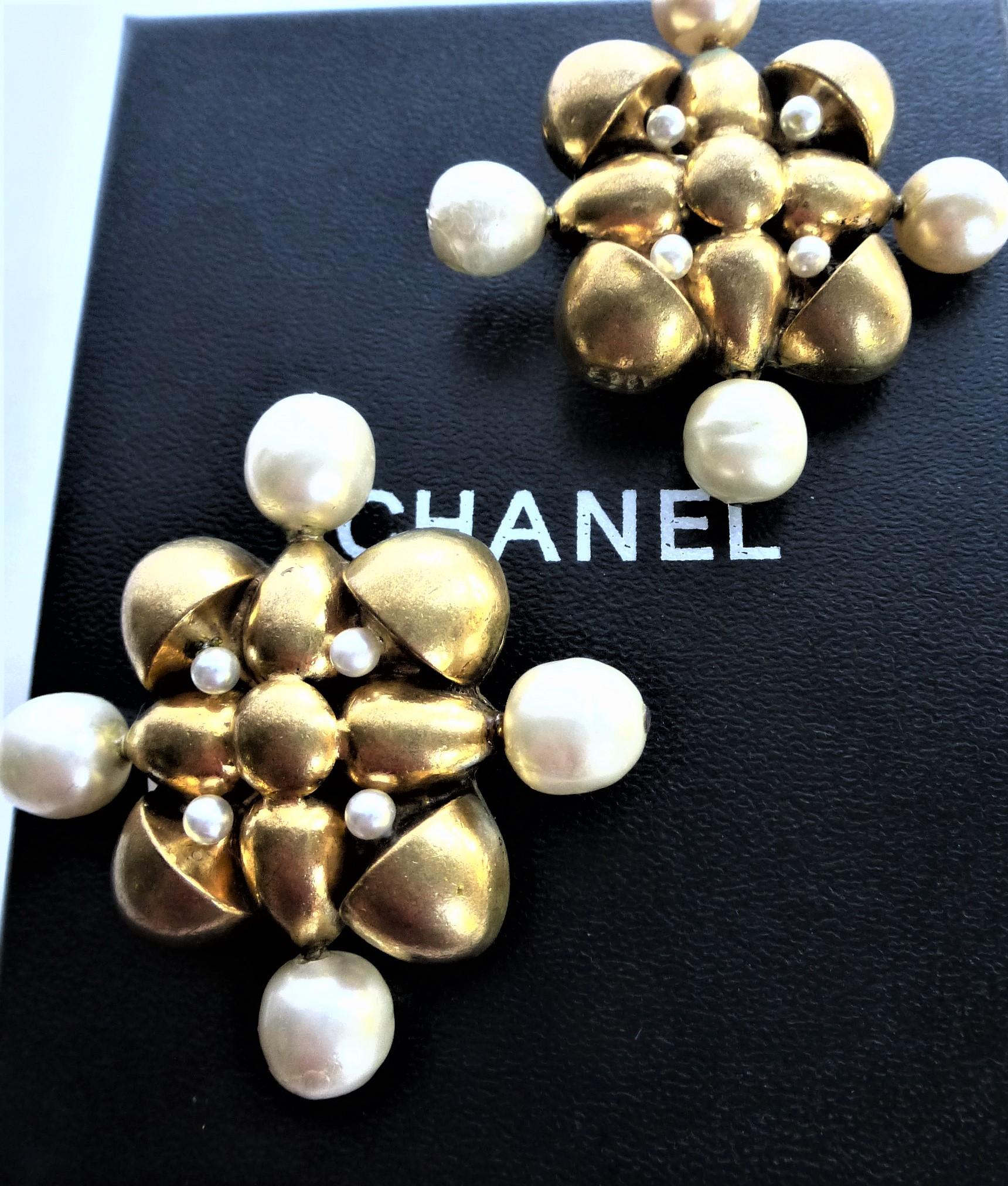  Chanel clip-on ear shape of a cross sign. 1970-1981, gold plated, faux pearls  For Sale 1