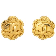 Vintage Chanel Earrings  Circa 1996 CC Logo Flower Clip On Yellow Gold Tone