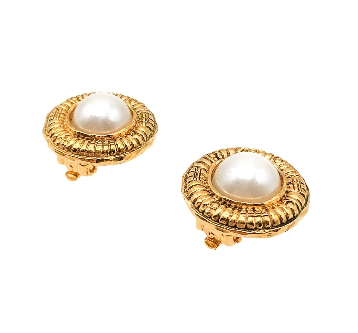 A beautiful pair of Vintage Chanel Pearl Earrings from the late 1970s, early 1980s. Celebrating one of the most iconic codes of Coco's House; pearls. Featuring an etruscan style mount for that added touch of glamour and intrigue. 

Since 1910 when