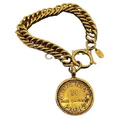Vintage Chanel Gold 31 Rue Cambon Medallion Charm Chain Bracelet