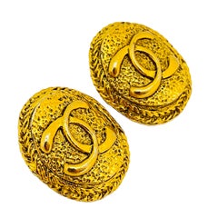 Vintage CHANEL gold CC logo designer runway clip on earrings