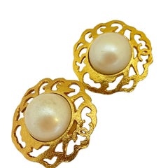 Vintage CHANEL gold CC logo pearl designer runway clip on earrings