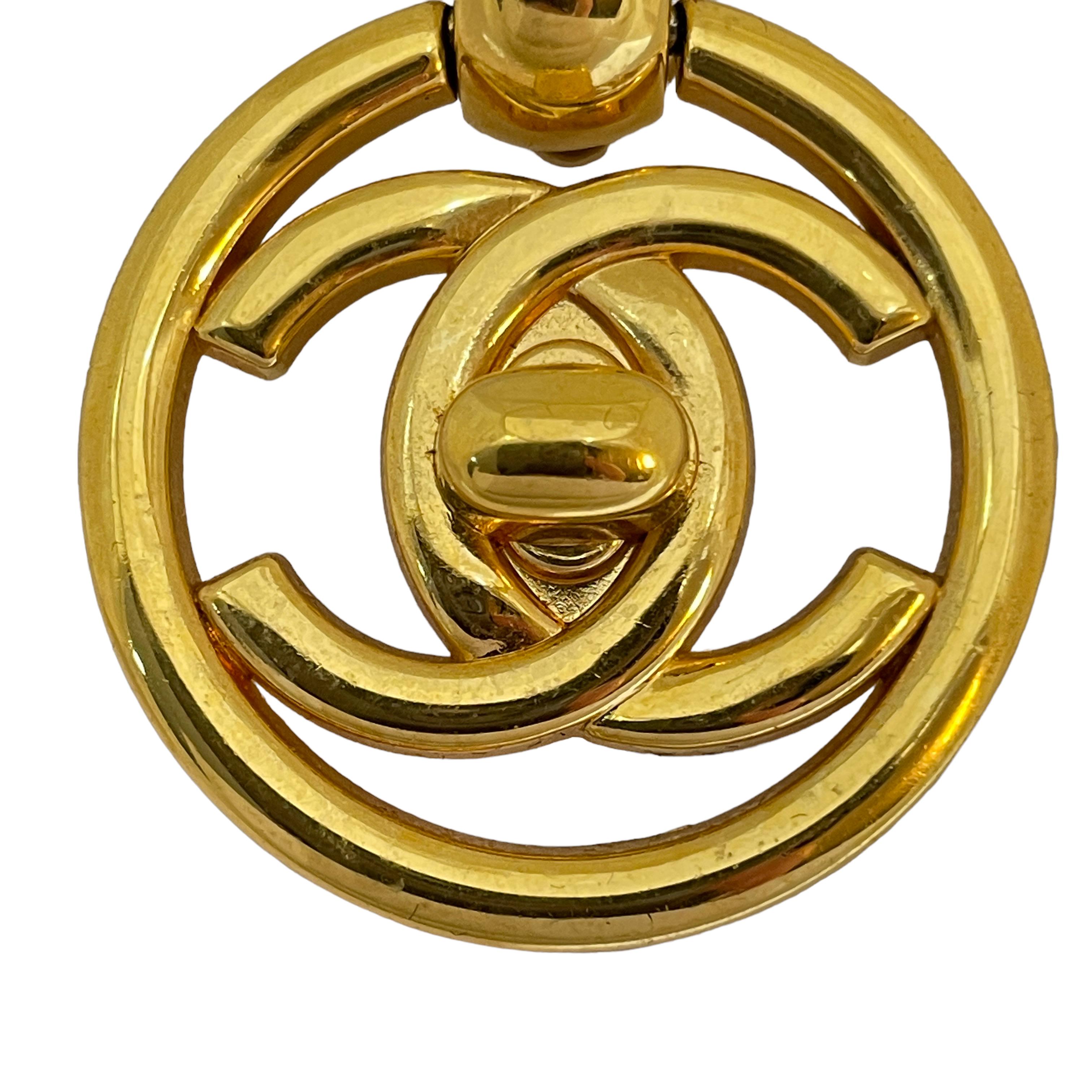 Vintage CHANEL gold CC logo turnlock door knocker runway clip on earrings In Good Condition In Palos Hills, IL