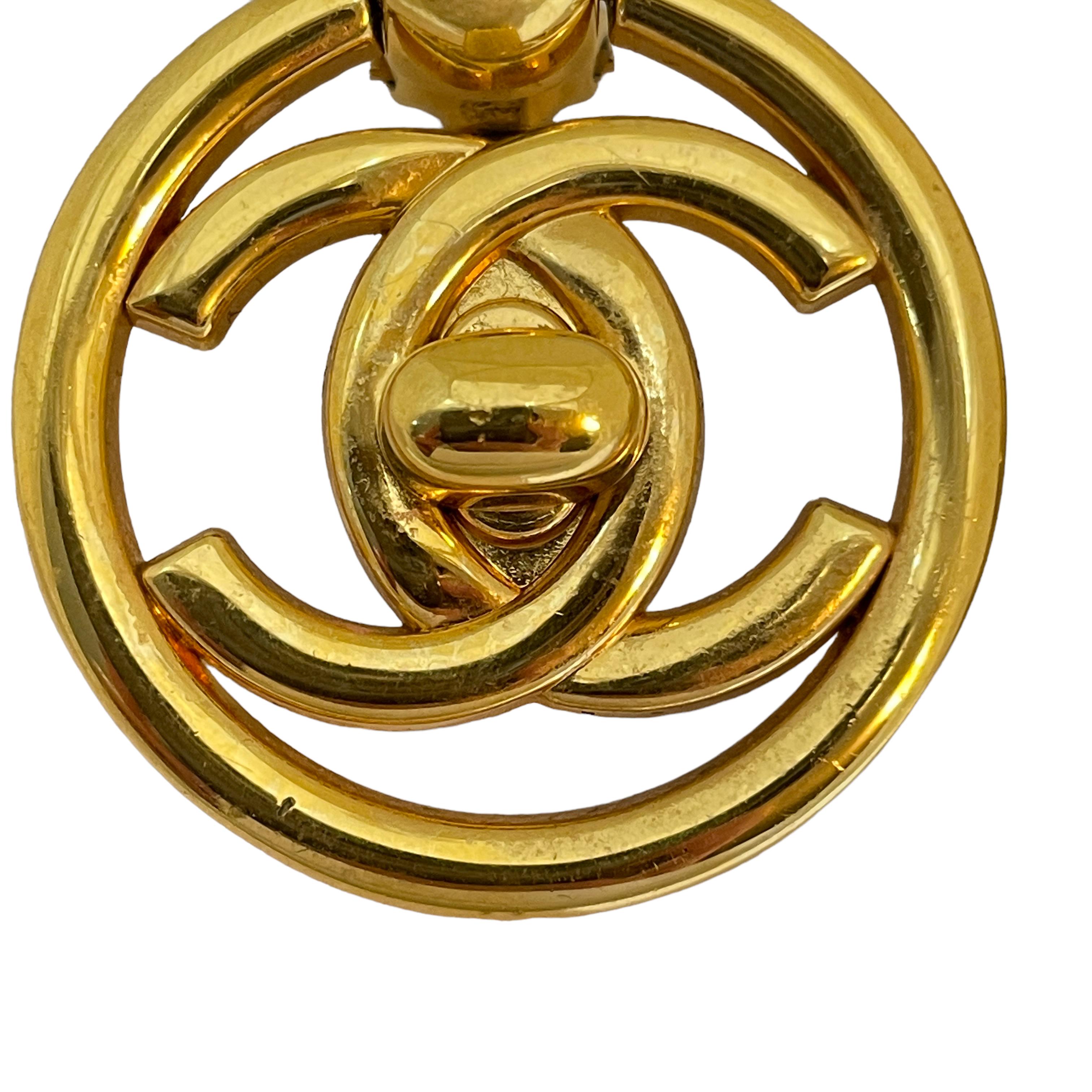 Women's or Men's Vintage CHANEL gold CC logo turnlock door knocker runway clip on earrings