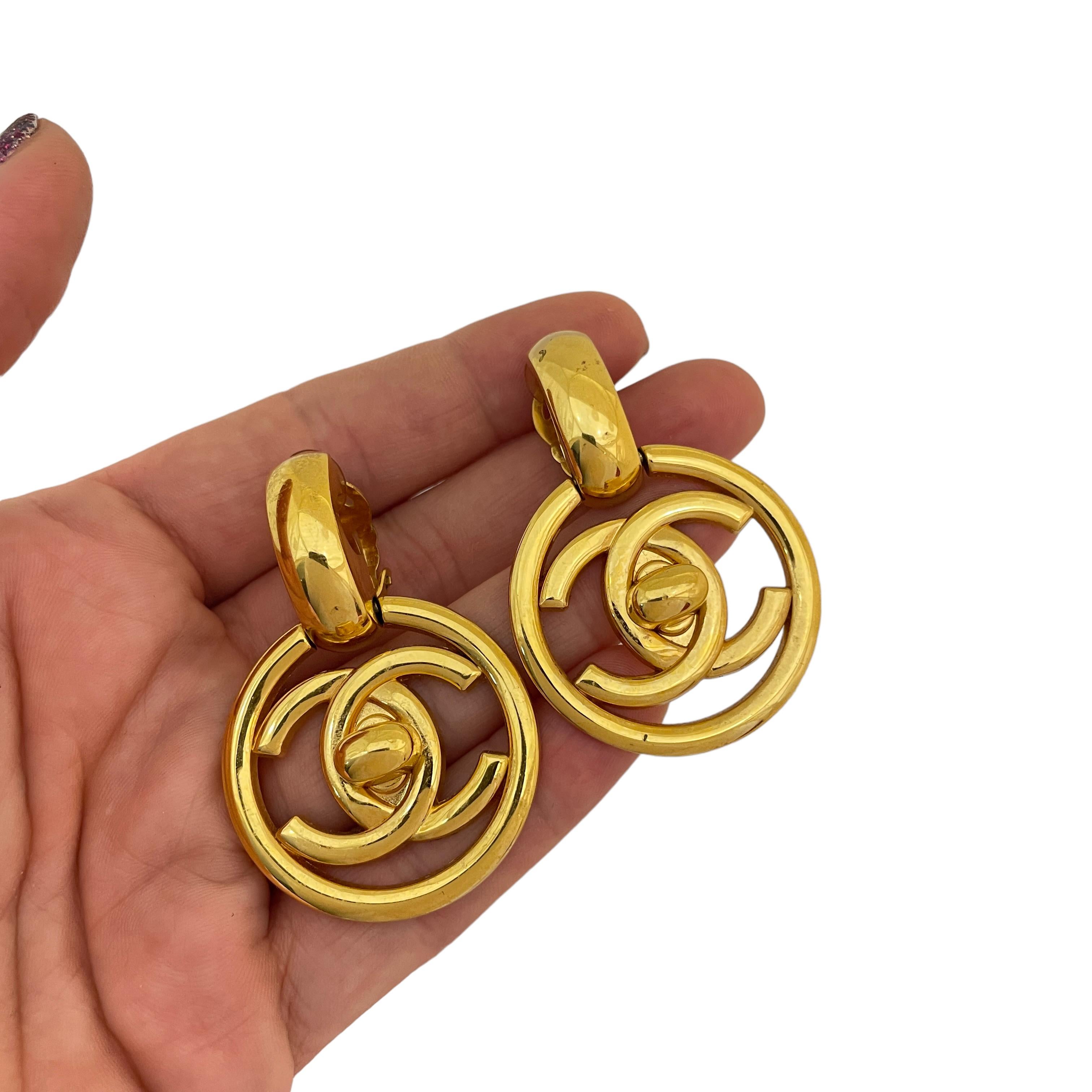 Vintage CHANEL gold CC logo turnlock door knocker runway clip on earrings 5
