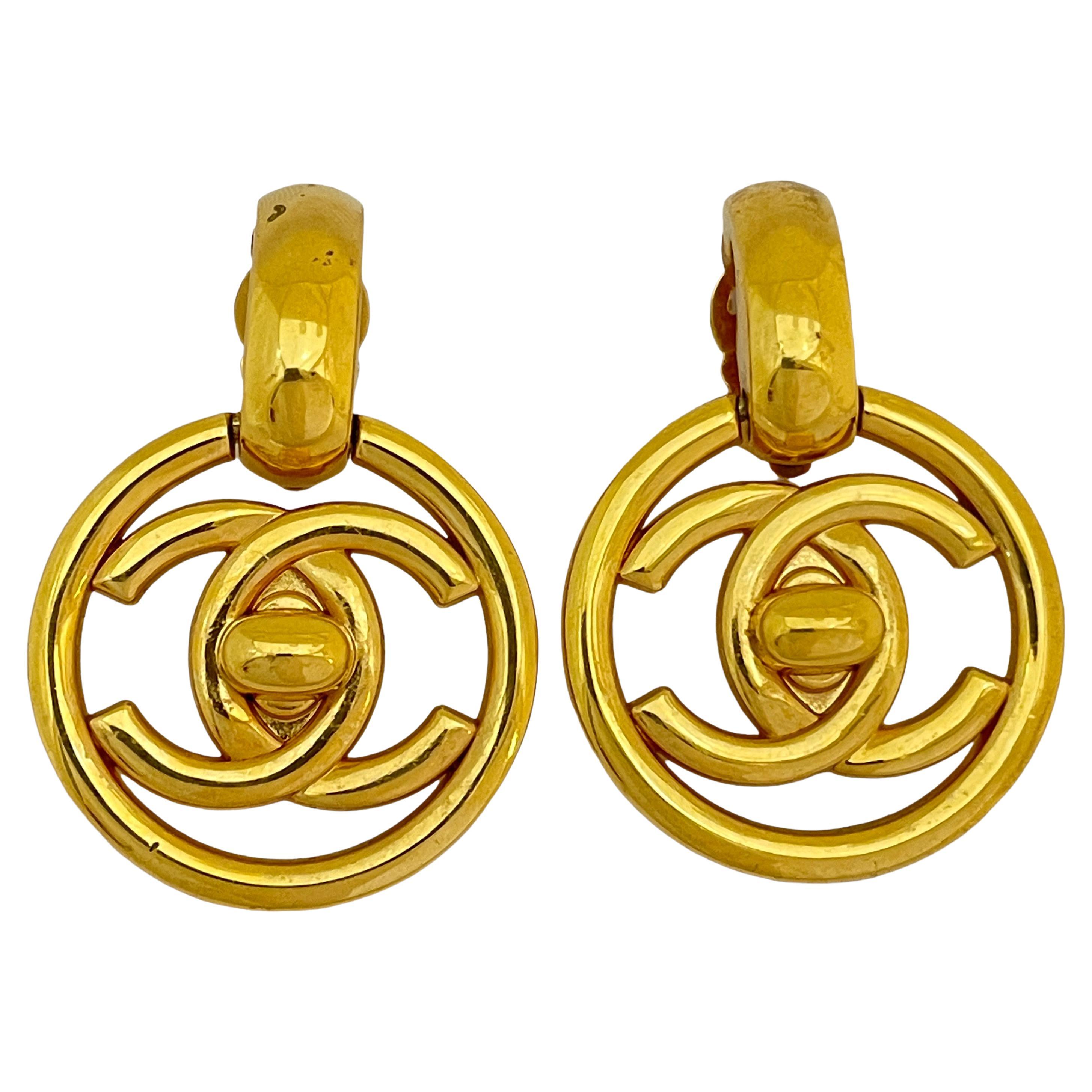 Vintage CHANEL gold CC logo turnlock door knocker runway clip on earrings