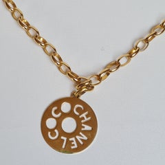 Vintage Chanel Gold Logo Cut Out Pendant Necklace