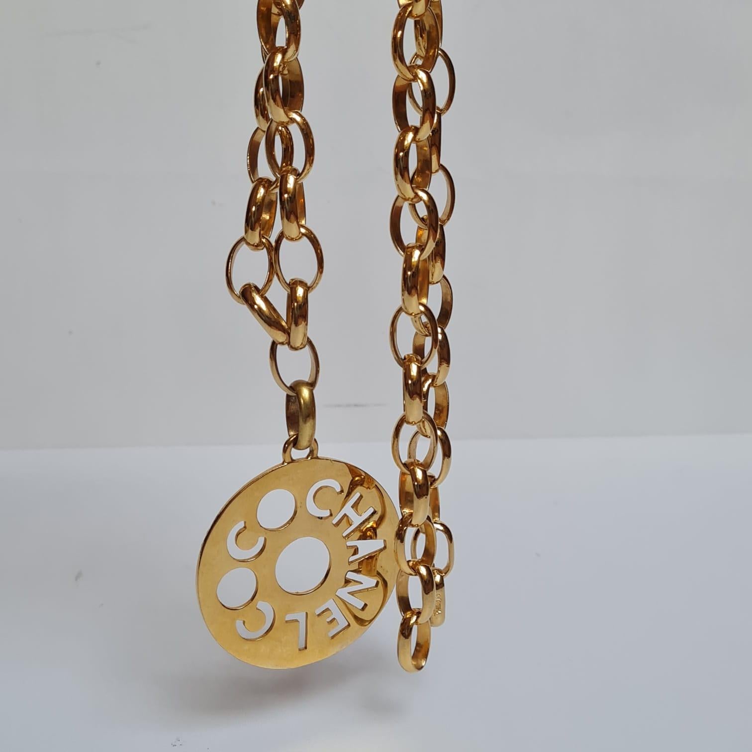 Vintage Chanel Gold Logo Cut Out Pendant Necklace For Sale 2