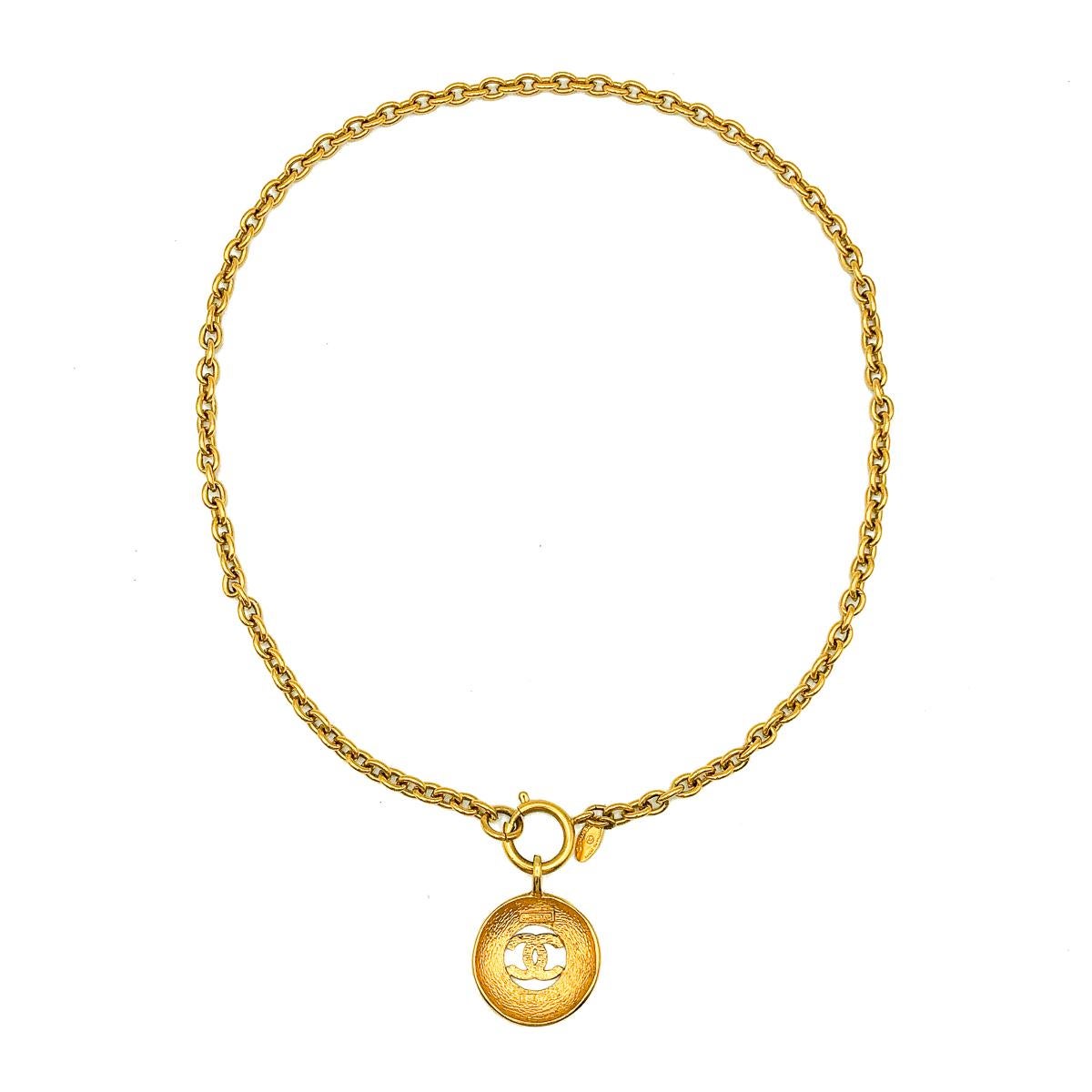 Women's or Men's Vintage Chanel Gold Sunburst Interlocking CC Medallion Necklace 1980s