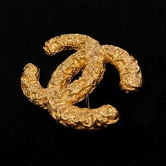 Vintage Chanel Gold Tone Gilt Metal CC Logo Lava Brooch 95A